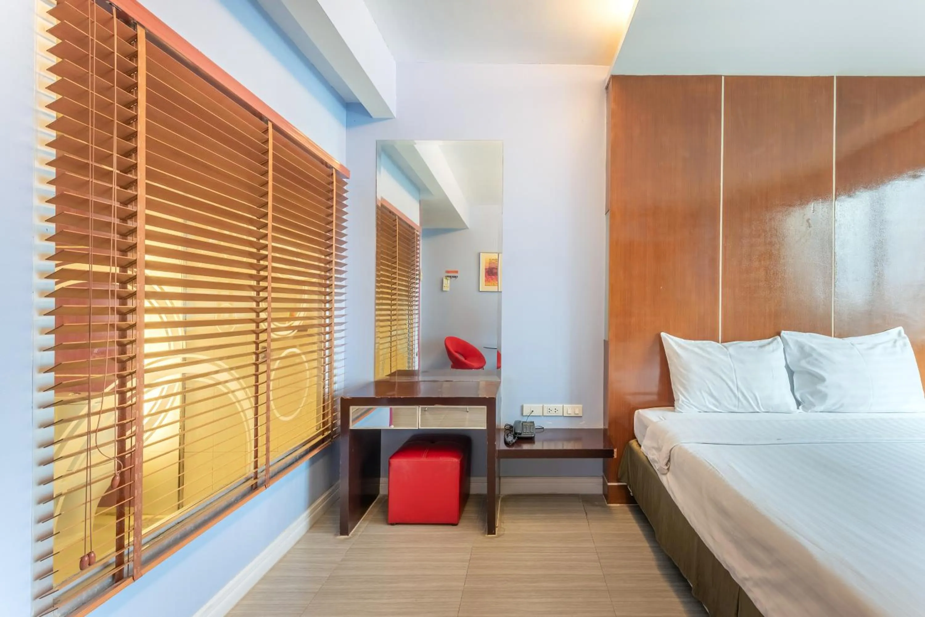 Bed in SHIN Hotel V-ONE Korat