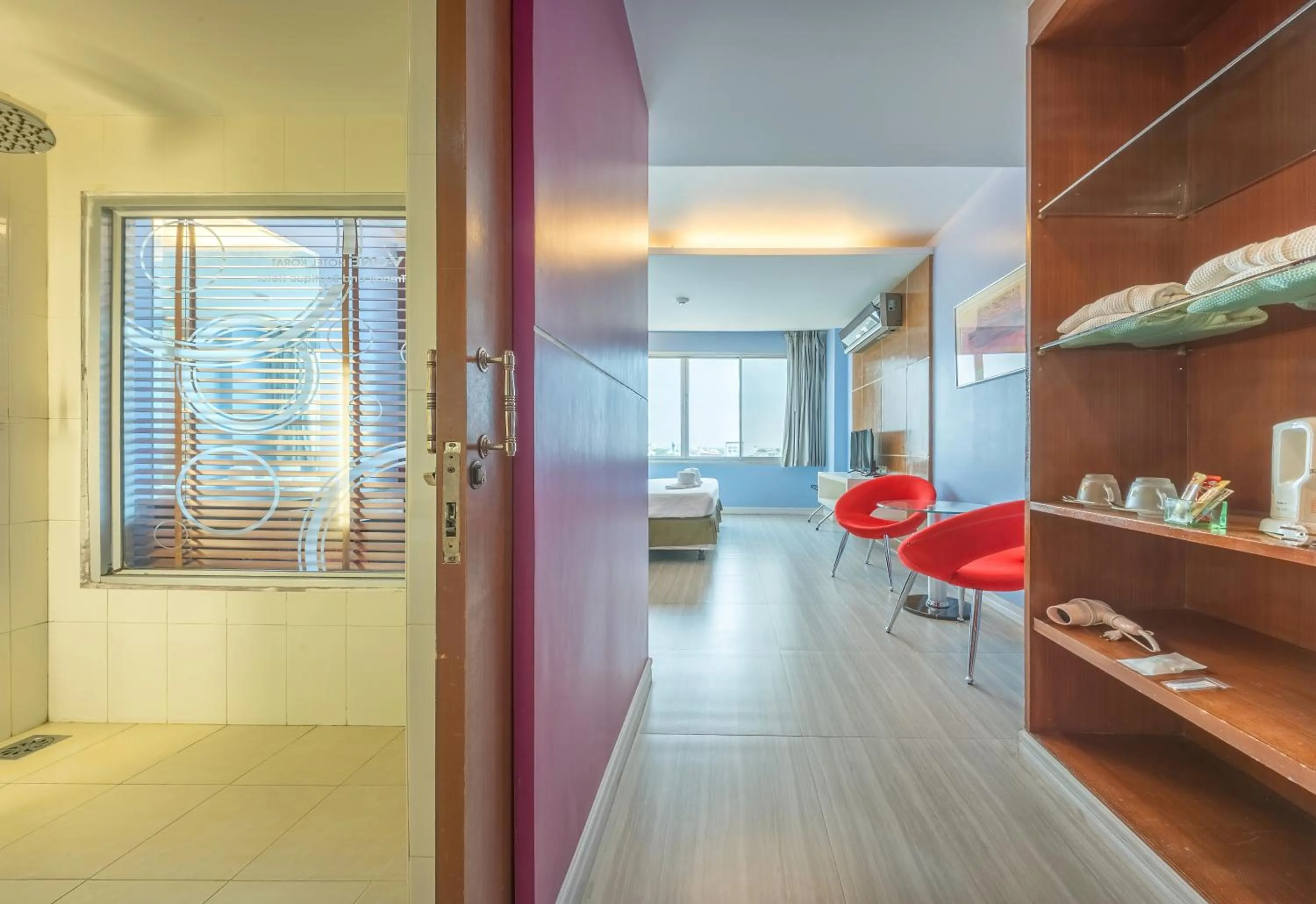 Living room in SHIN Hotel V-ONE Korat