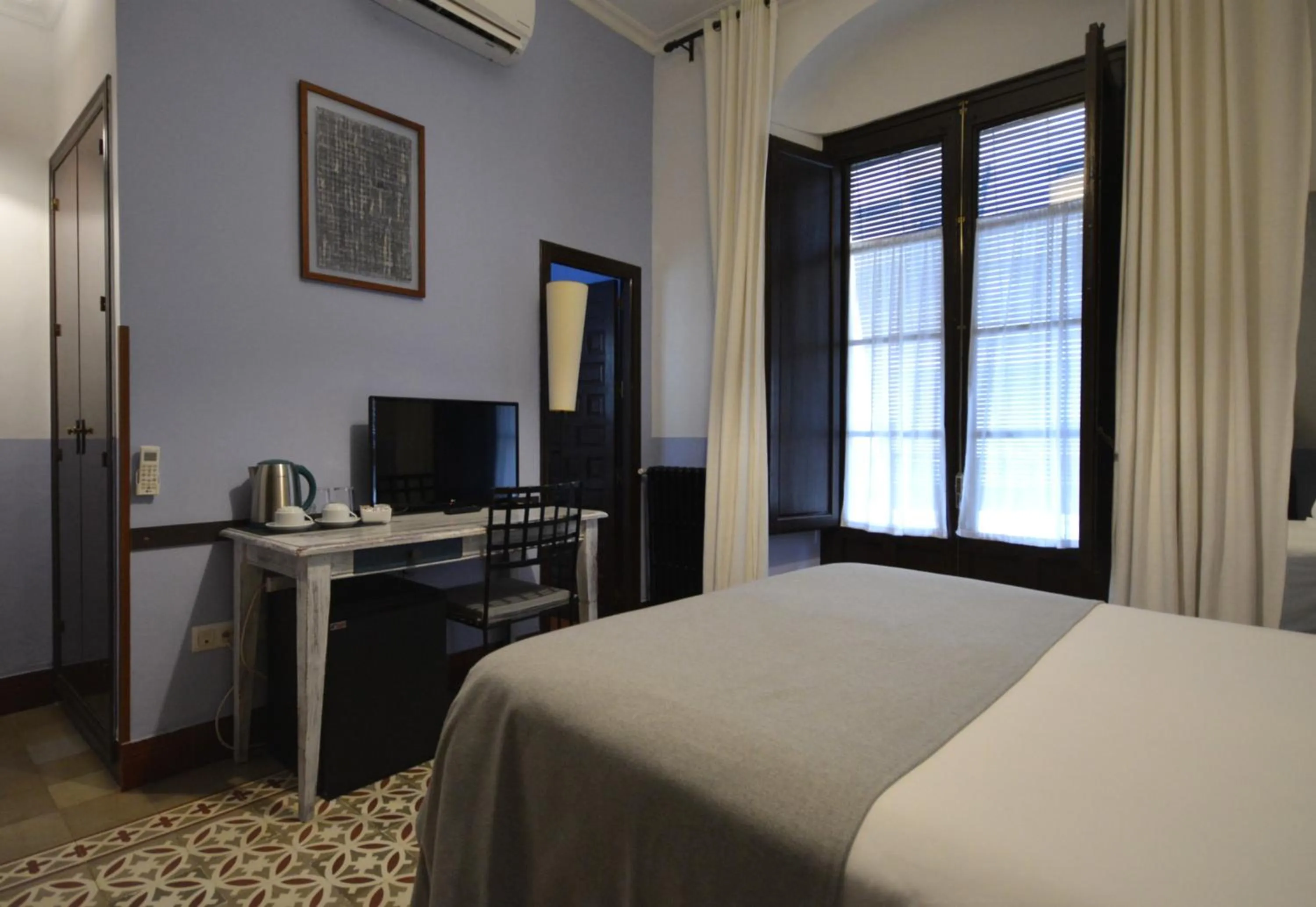 Bed in Hotel Casa de los Azulejos