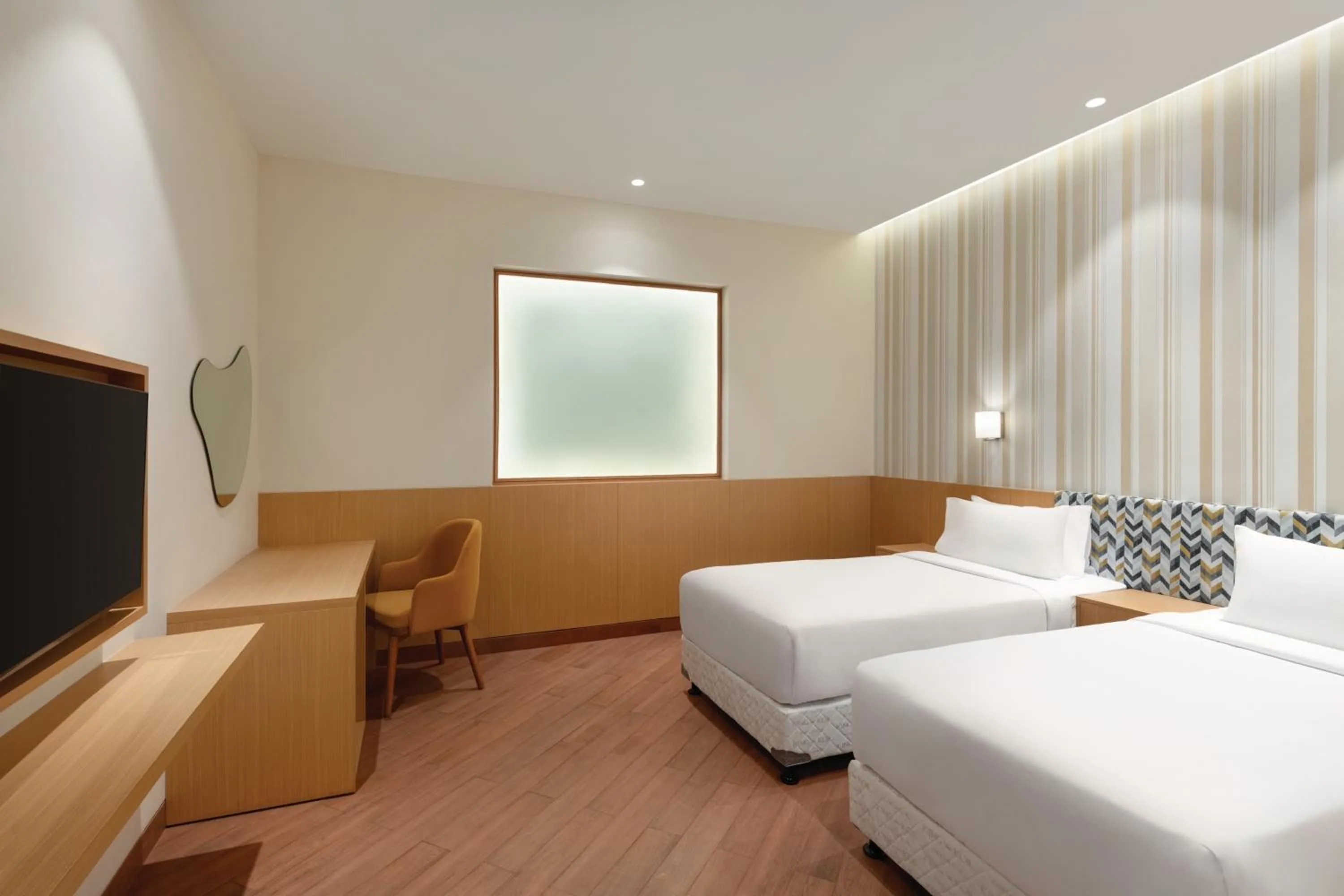 Bed in Ramada Encore by Wyndham Lucknow Airport