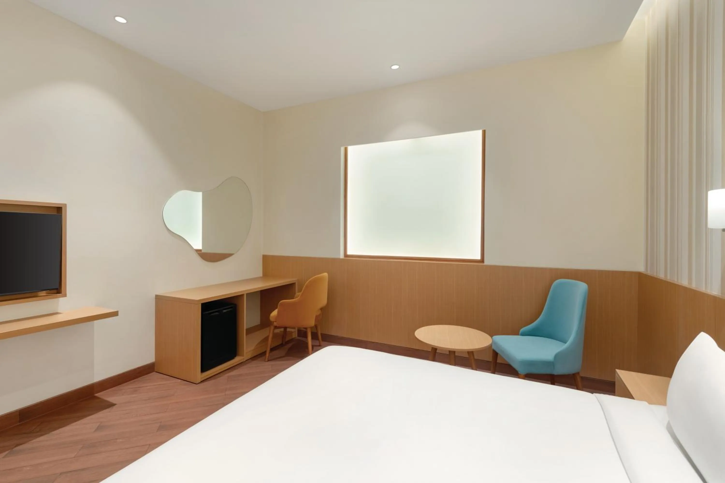 Bed in Ramada Encore by Wyndham Lucknow Airport