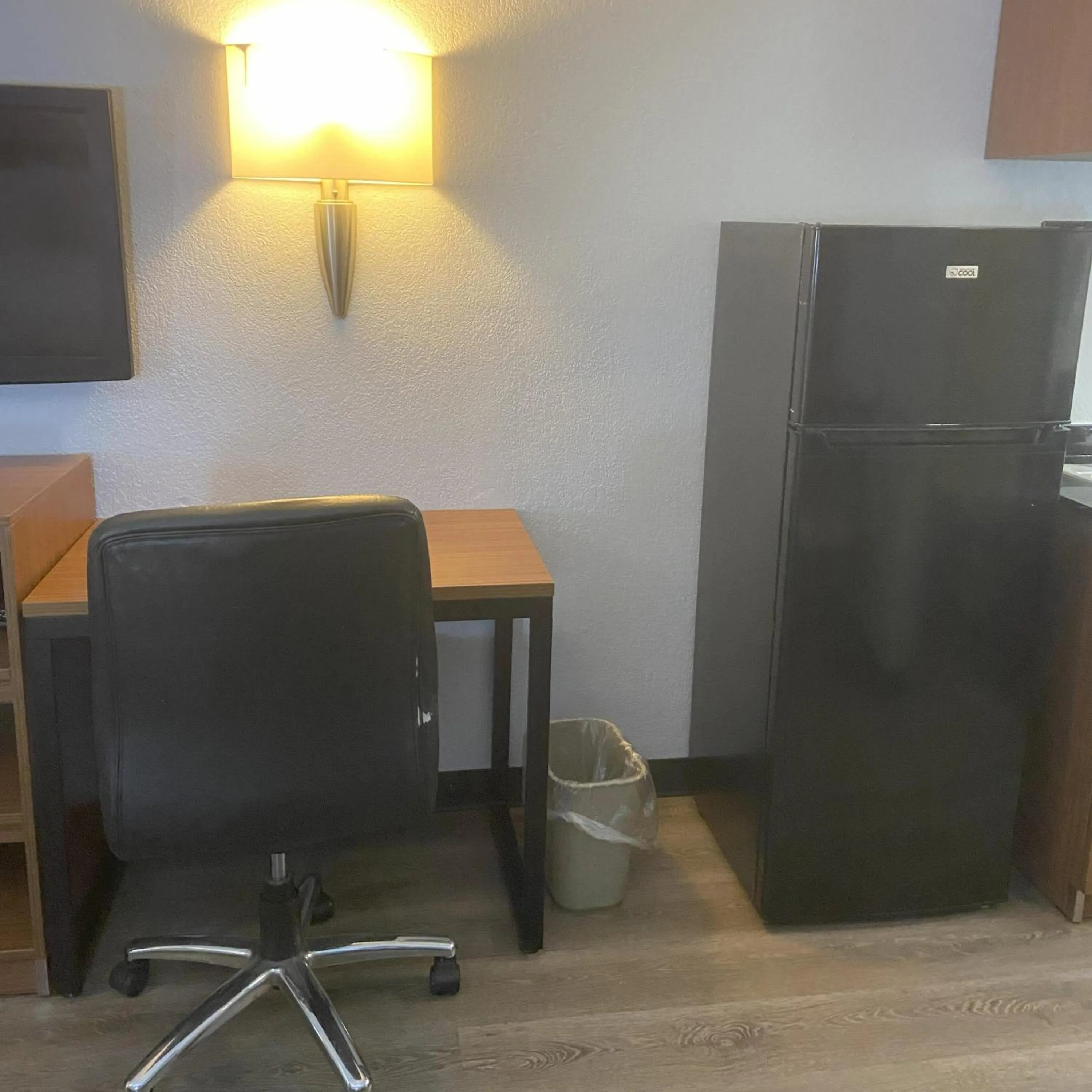 Bedroom in HomeTowne Studios by Red Roof Buffalo - Niagara Airport