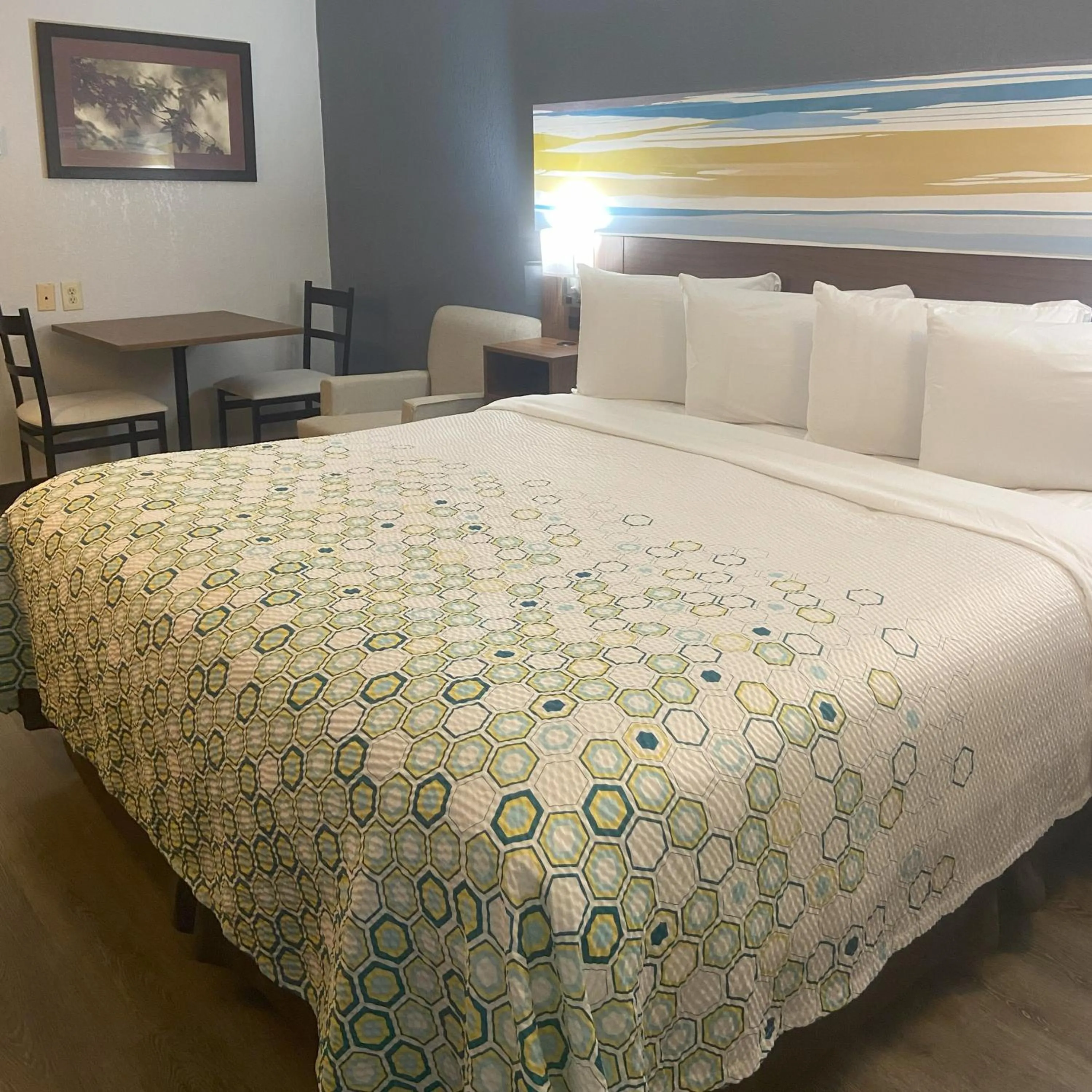 Bed in HomeTowne Studios by Red Roof Buffalo - Niagara Airport