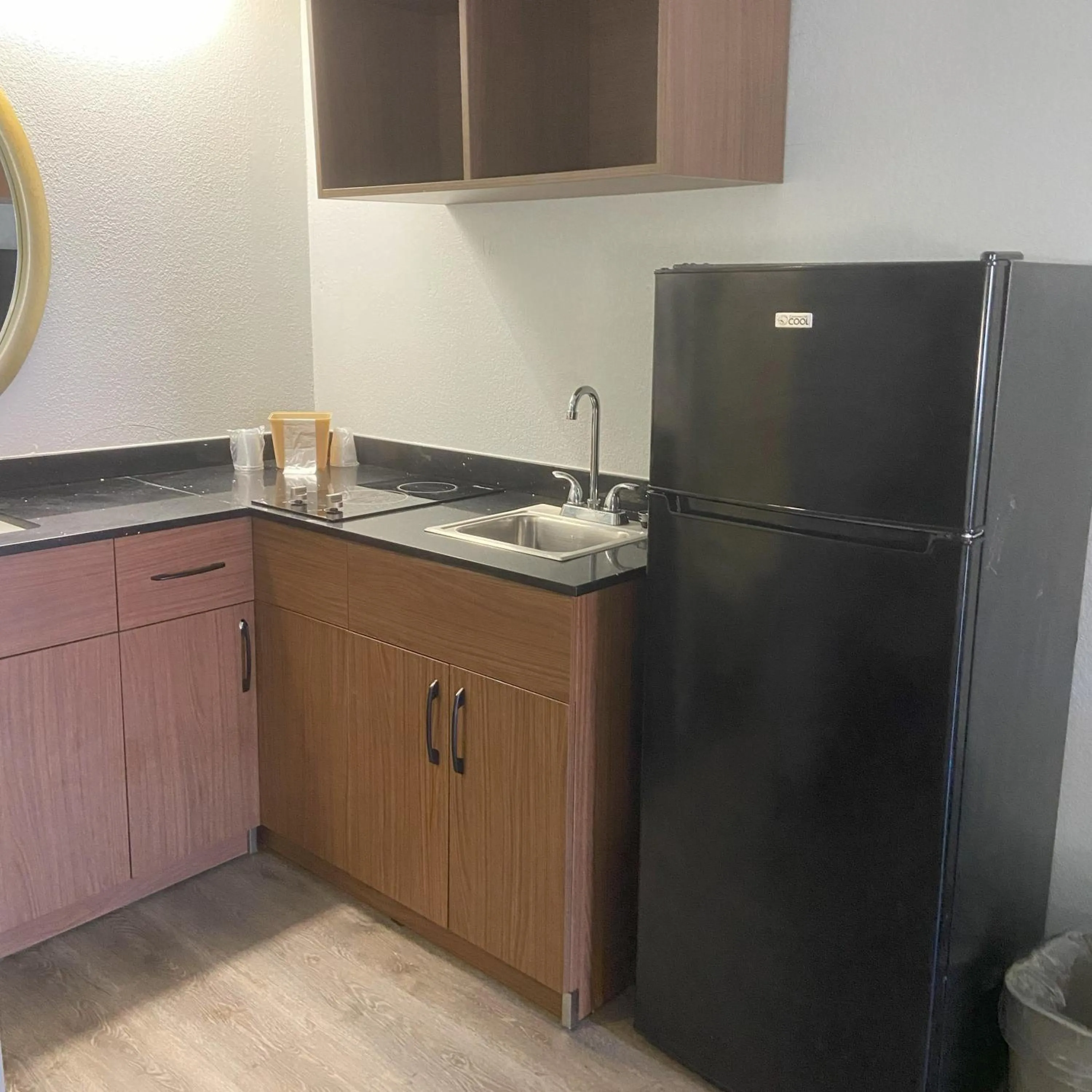 Kitchen or kitchenette in HomeTowne Studios by Red Roof Buffalo - Niagara Airport