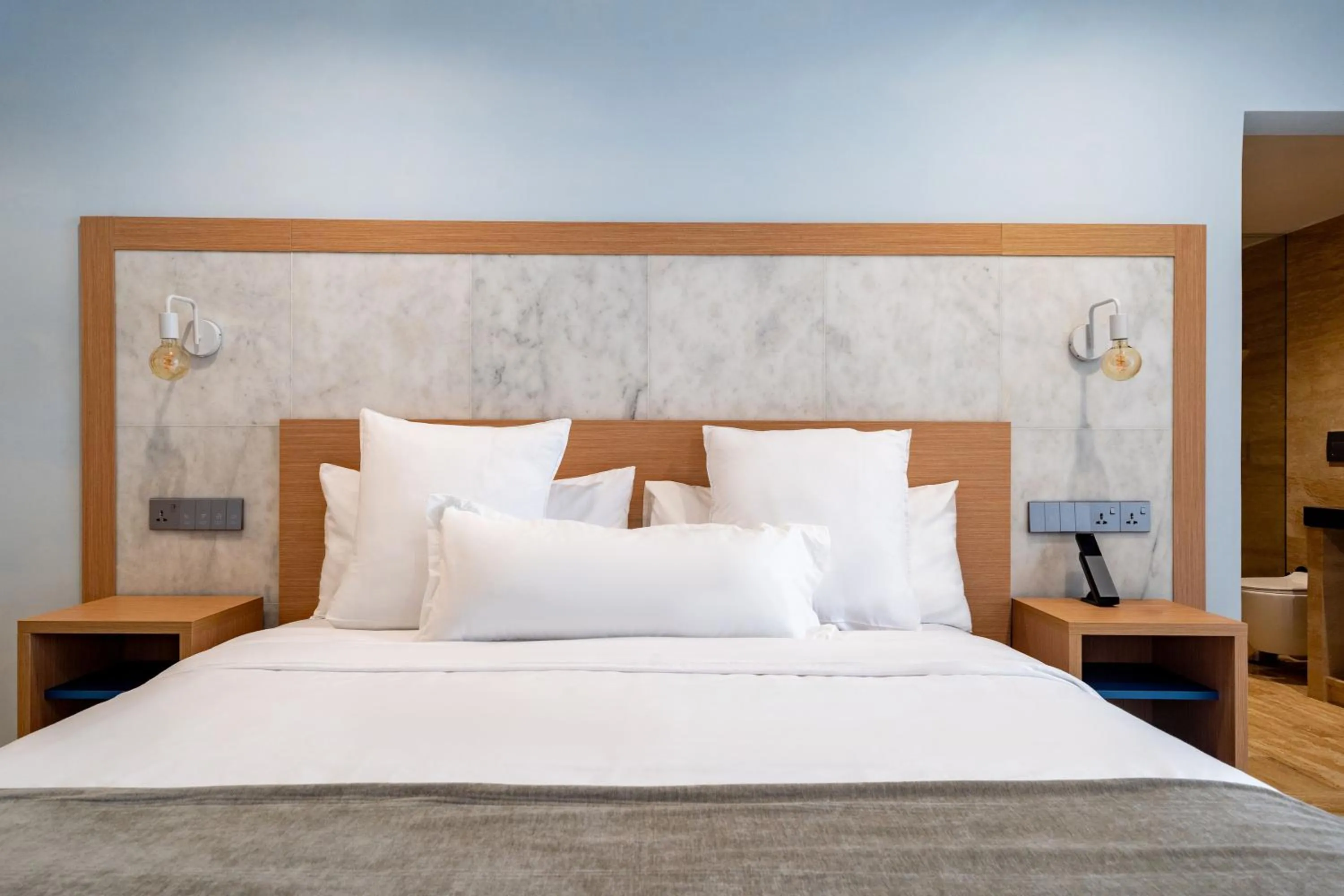 Bed in Reef Hotel & Spa