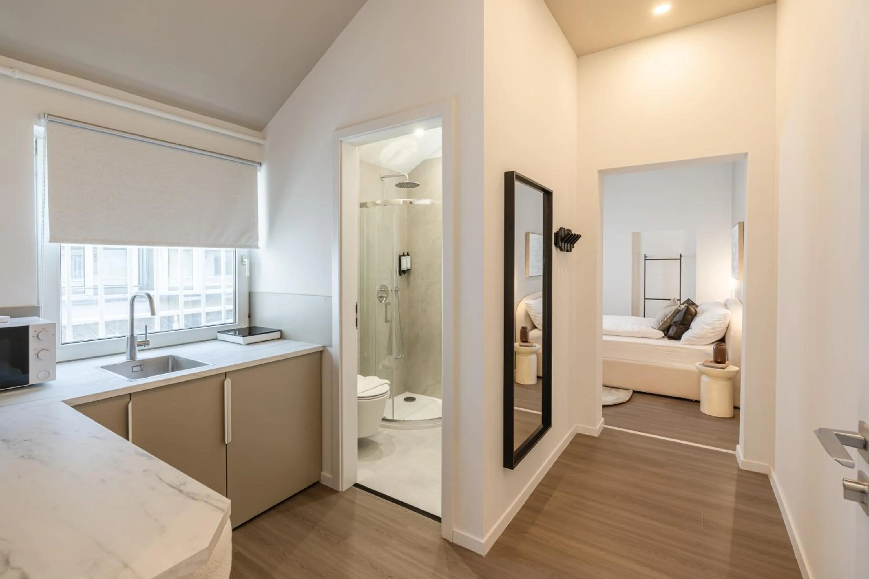 Kitchen or kitchenette, Bed in Oasis Luxe Boutique Suites by BQA