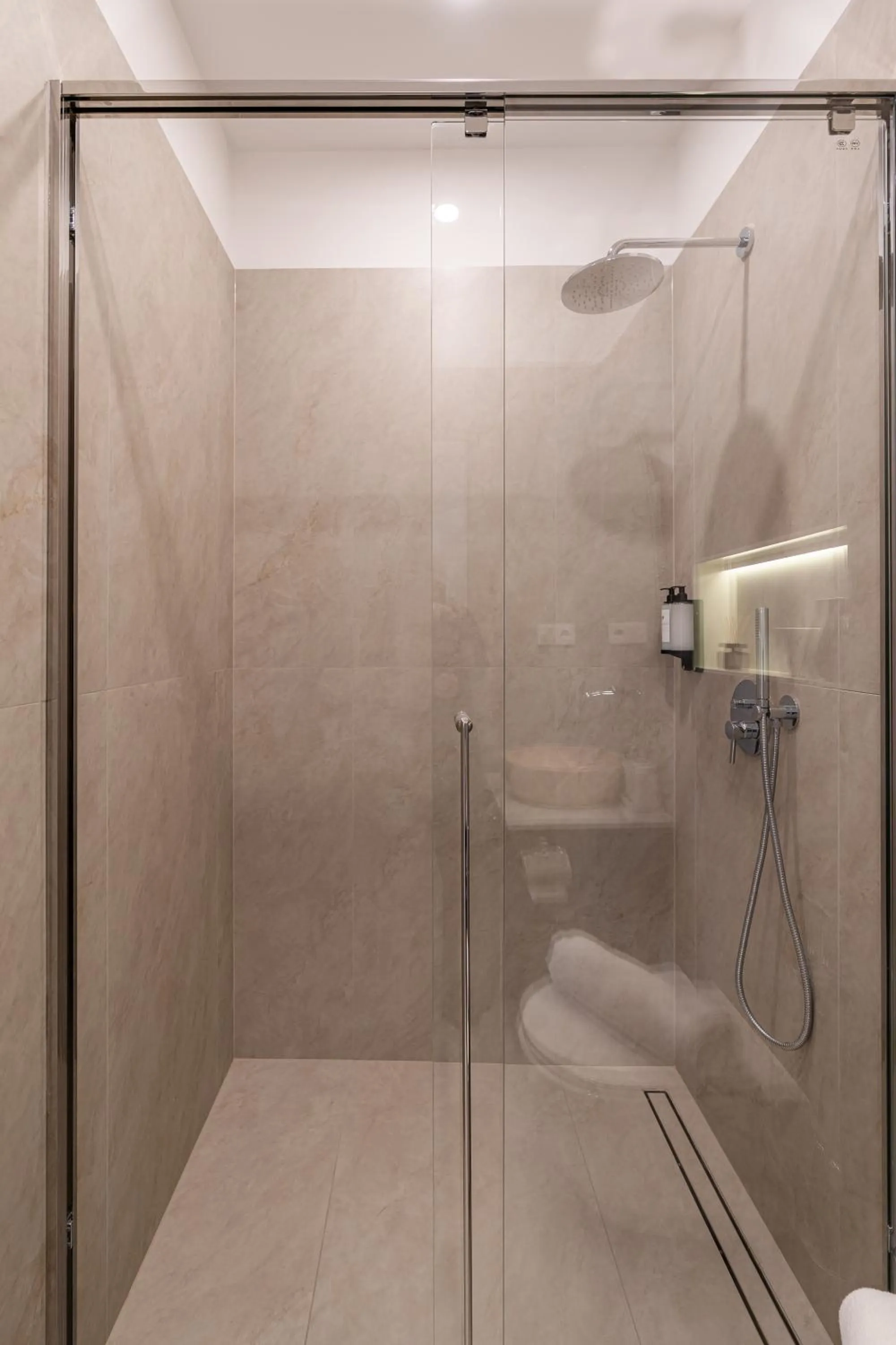 Shower in Oasis Luxe Boutique Suites by BQA
