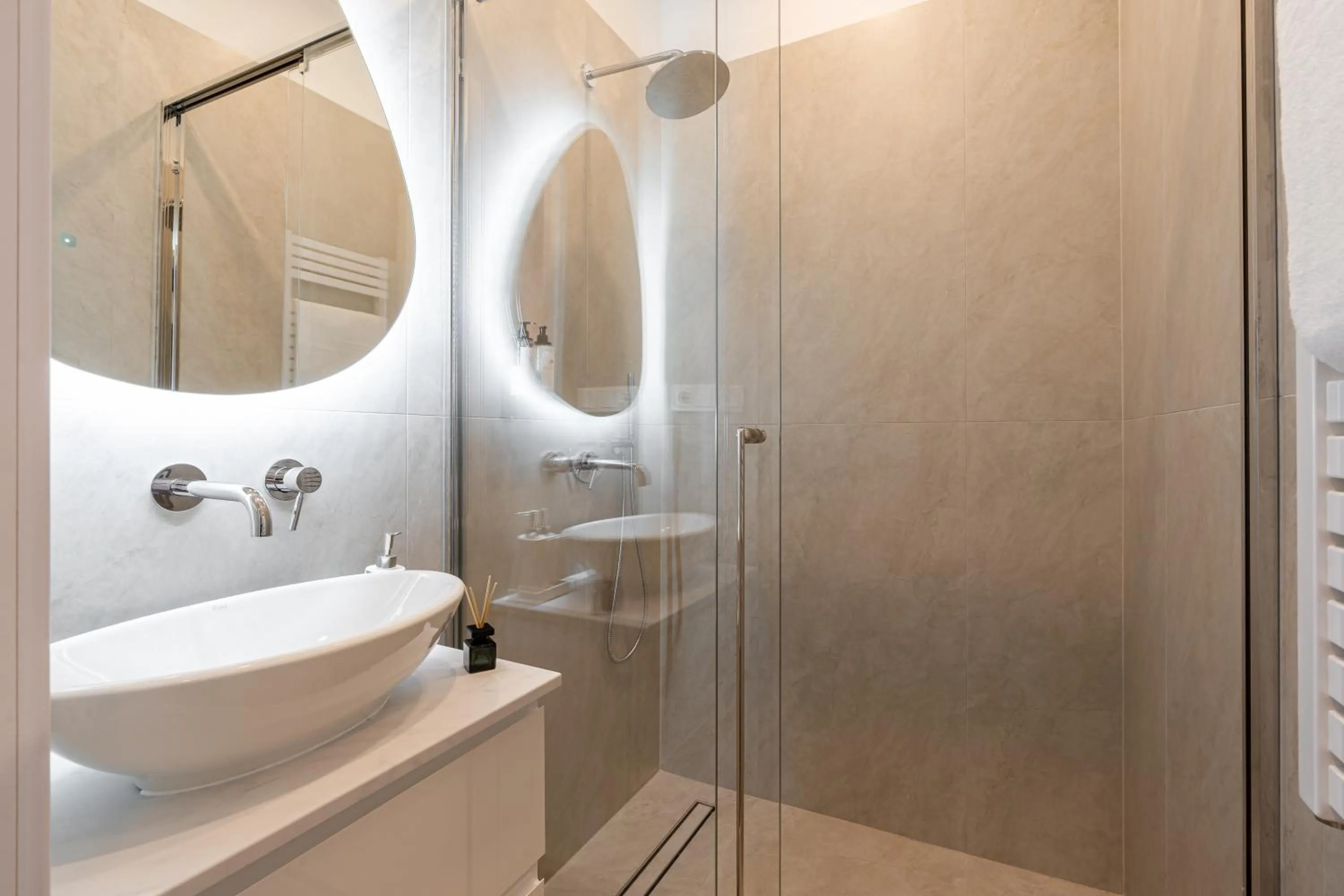 Shower in Oasis Luxe Boutique Suites by BQA