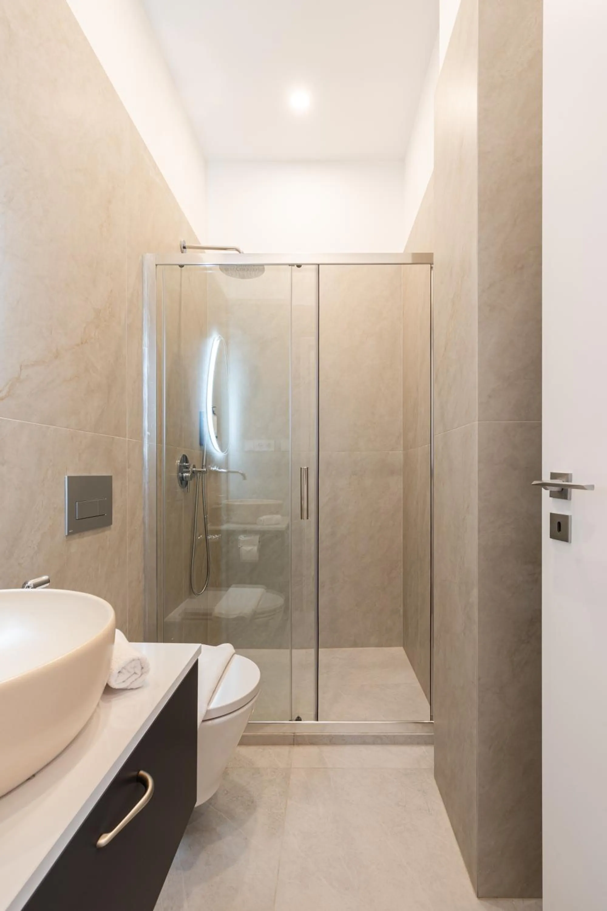 Shower in Oasis Luxe Boutique Suites by BQA