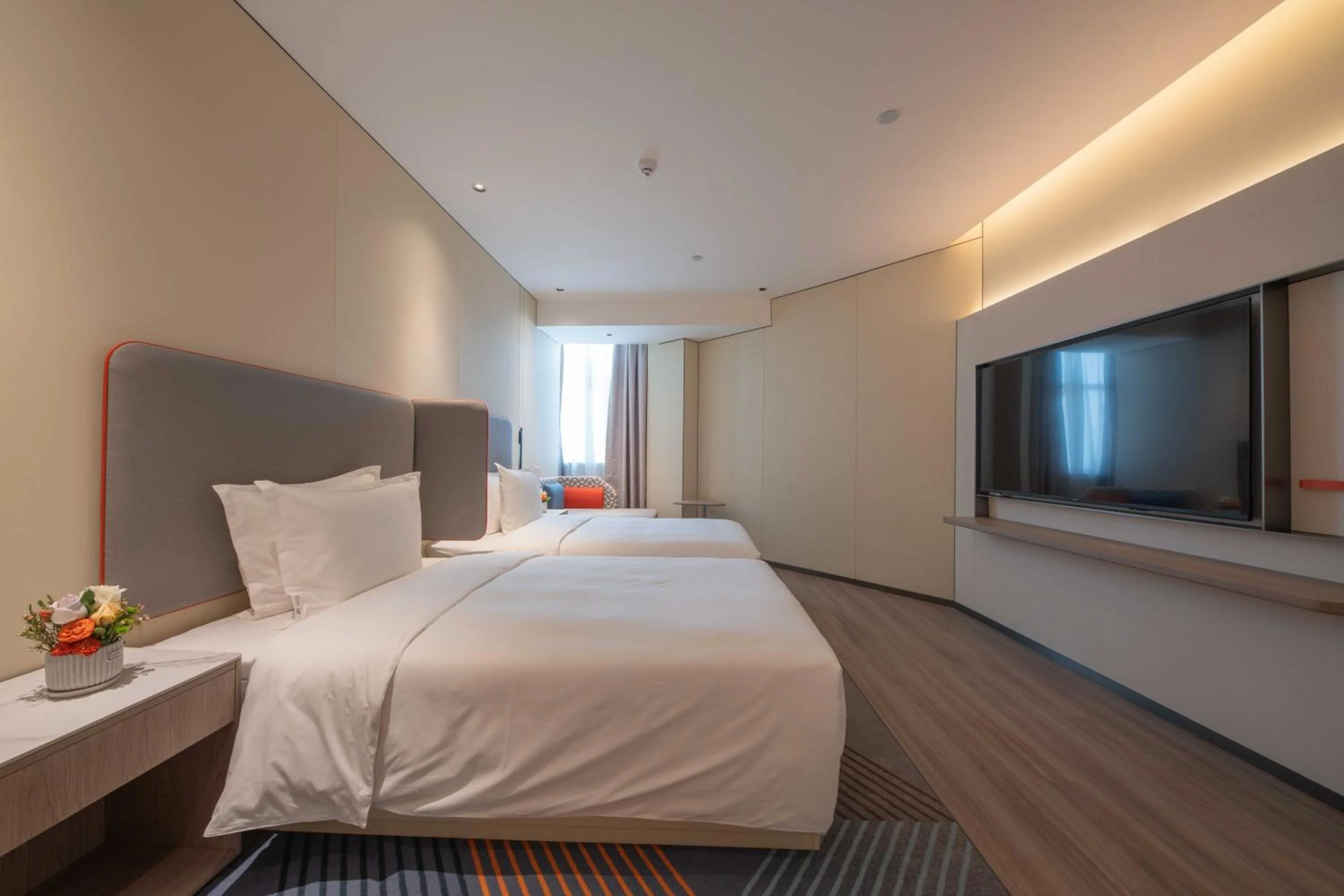 Bed in Holiday Inn Express Turpan, an IHG Hotel