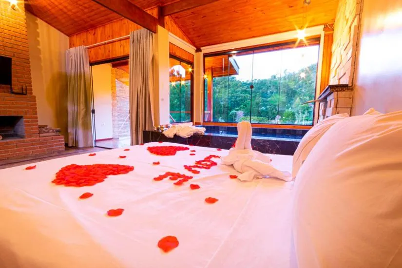 Bed in Pousada Chale Luiz