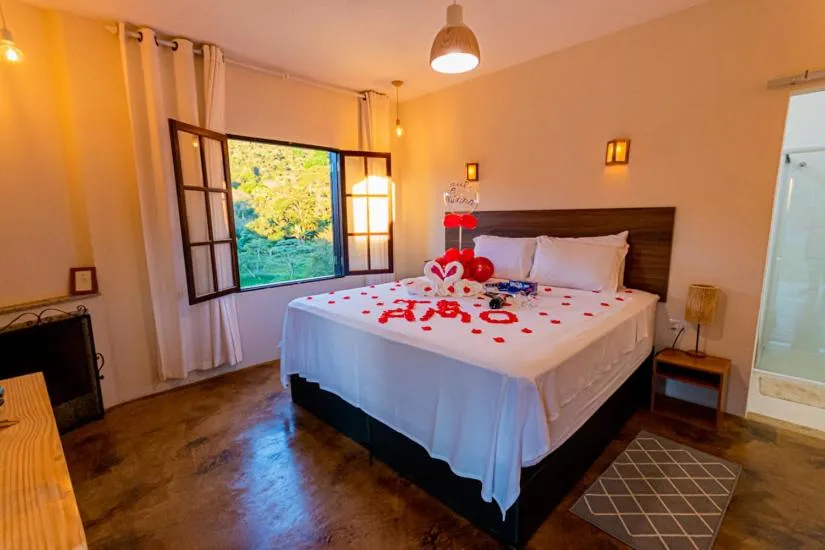 Bed in Pousada Chale Luiz