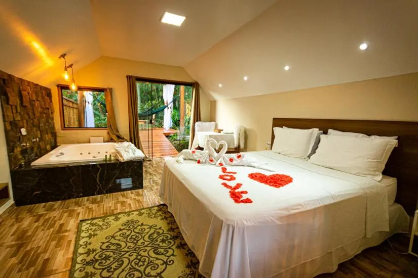 Bed in Pousada Chale Luiz