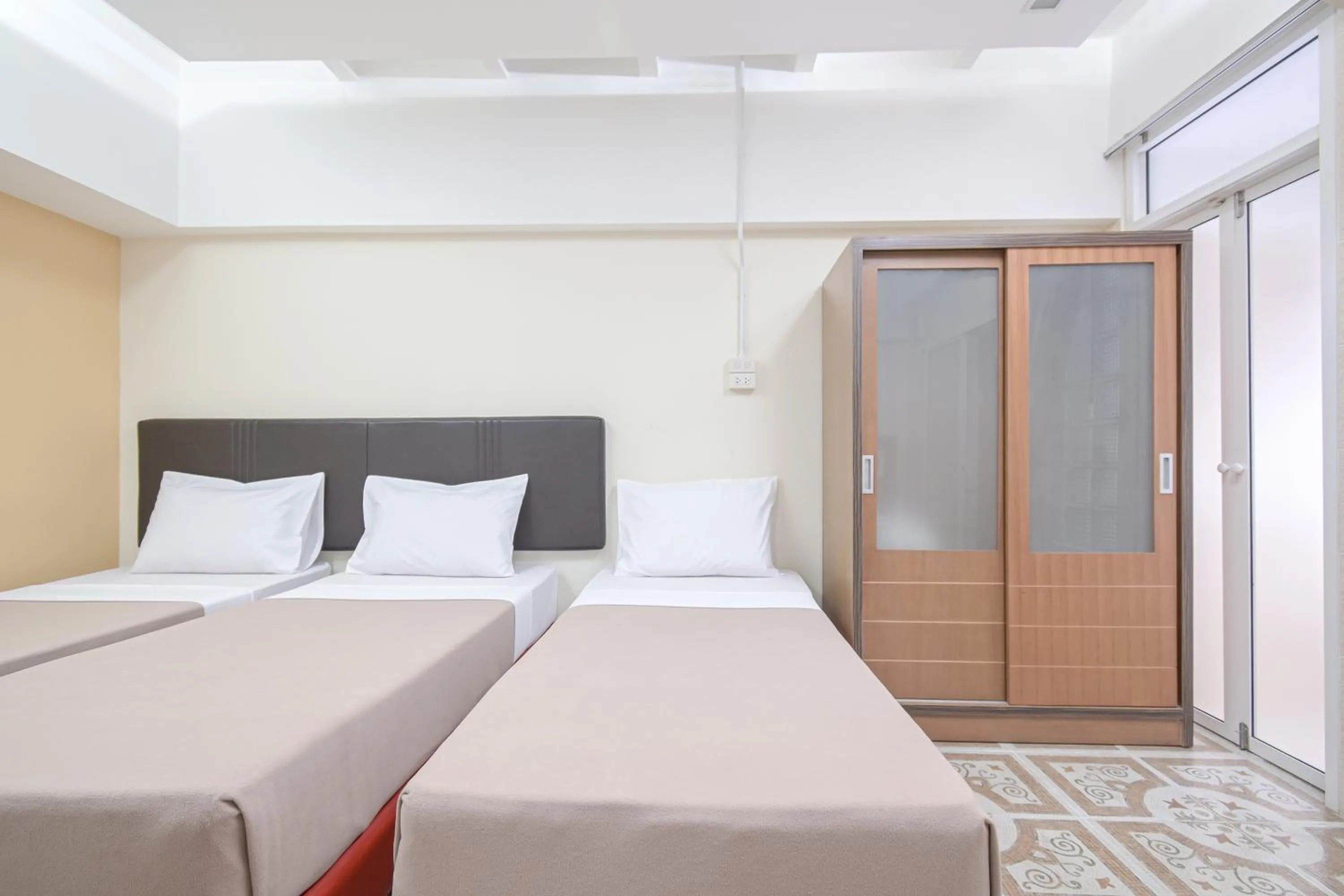 Bed in AC Habitat Bangkok