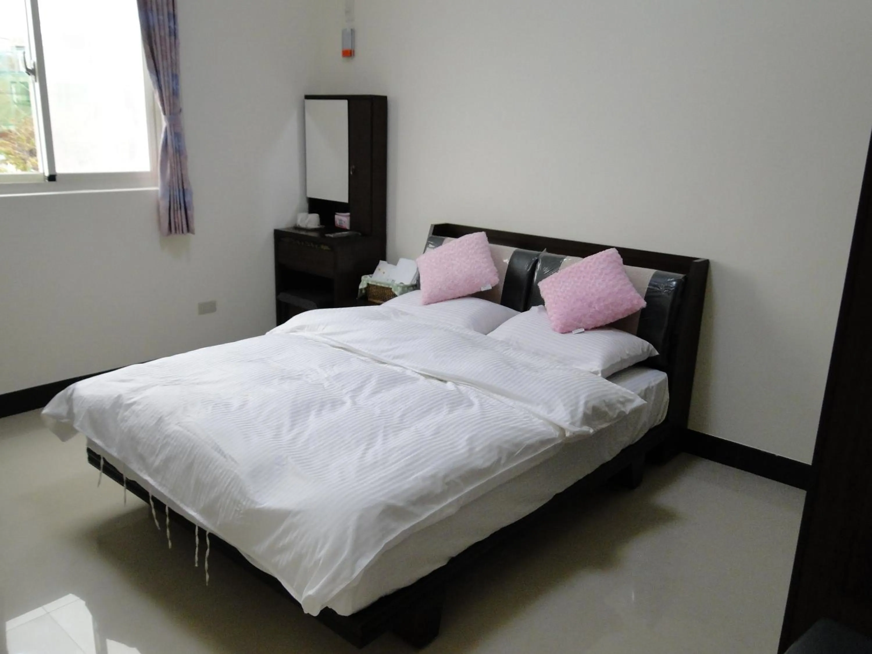 Bed in 成功民宿 KM Bed and Breakfast