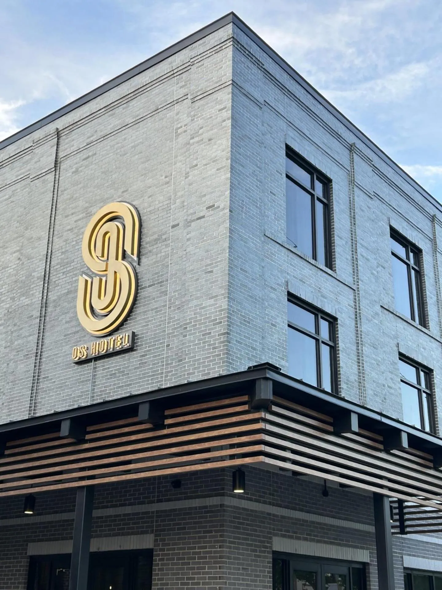 Property logo or sign in OS Hotel