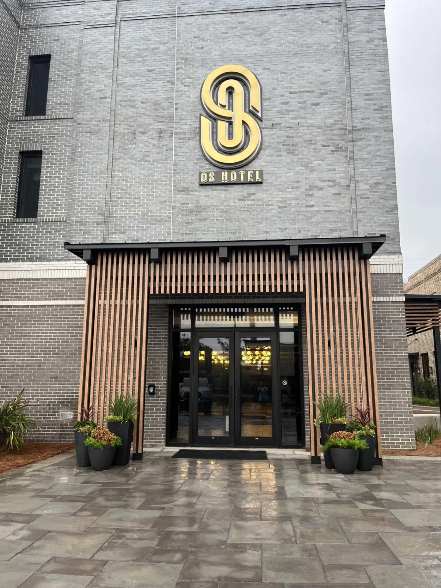 Property logo or sign in OS Hotel