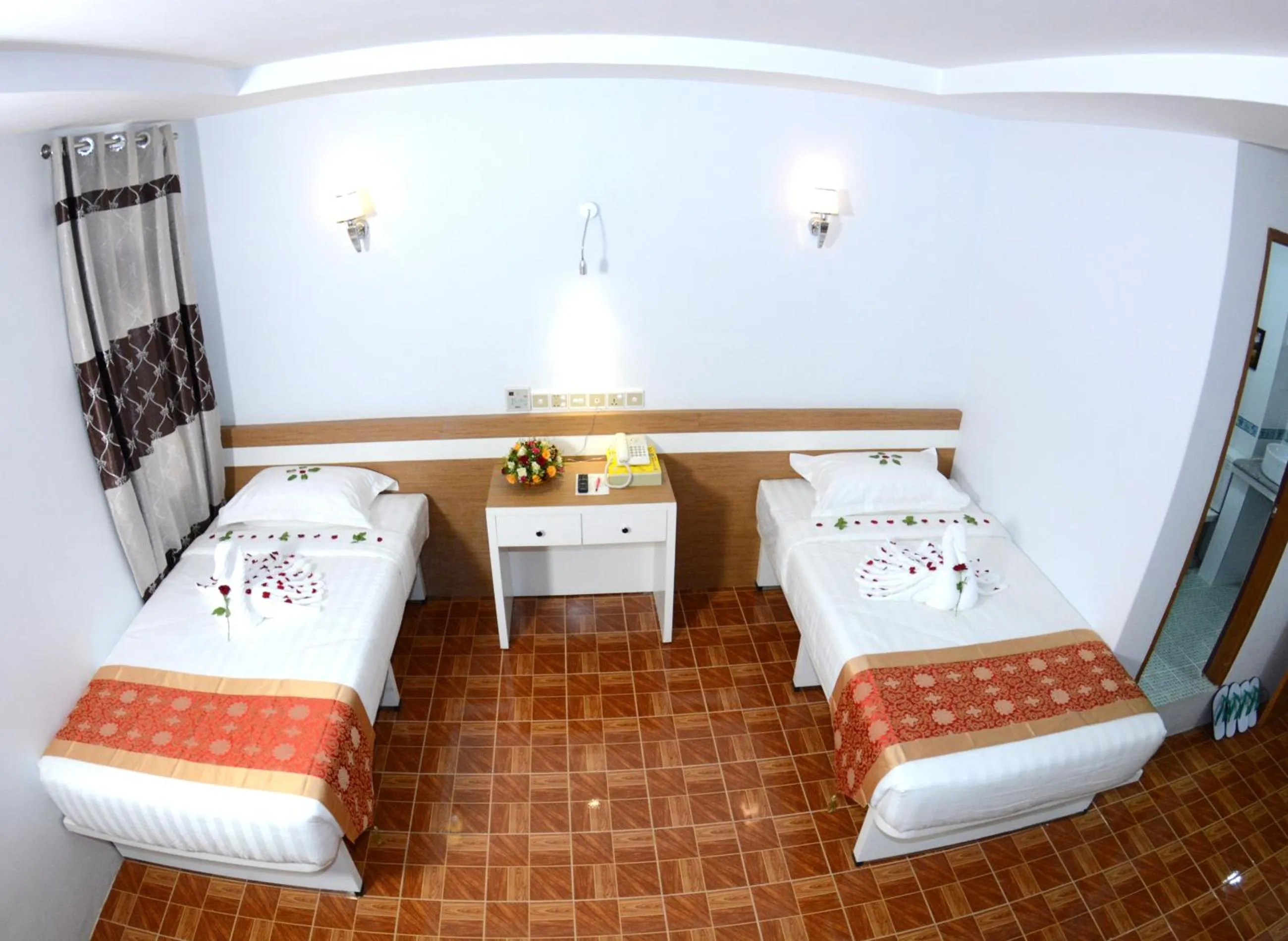 Bedroom in Kaung Myint Hotel