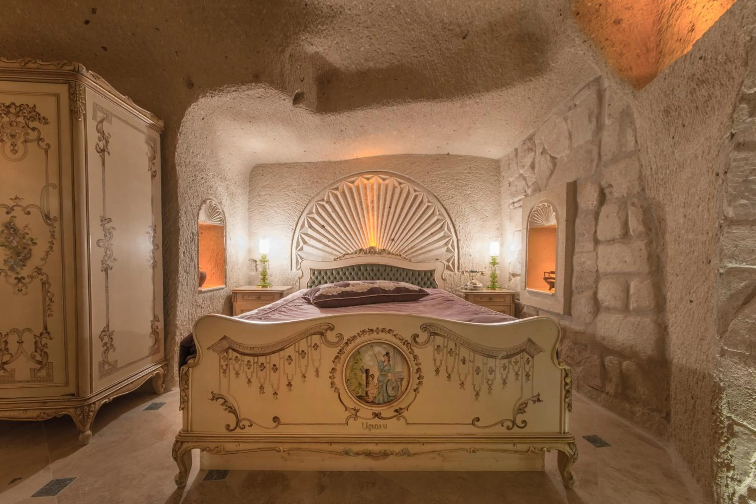 Bed in Elika Cave Suites & Spa