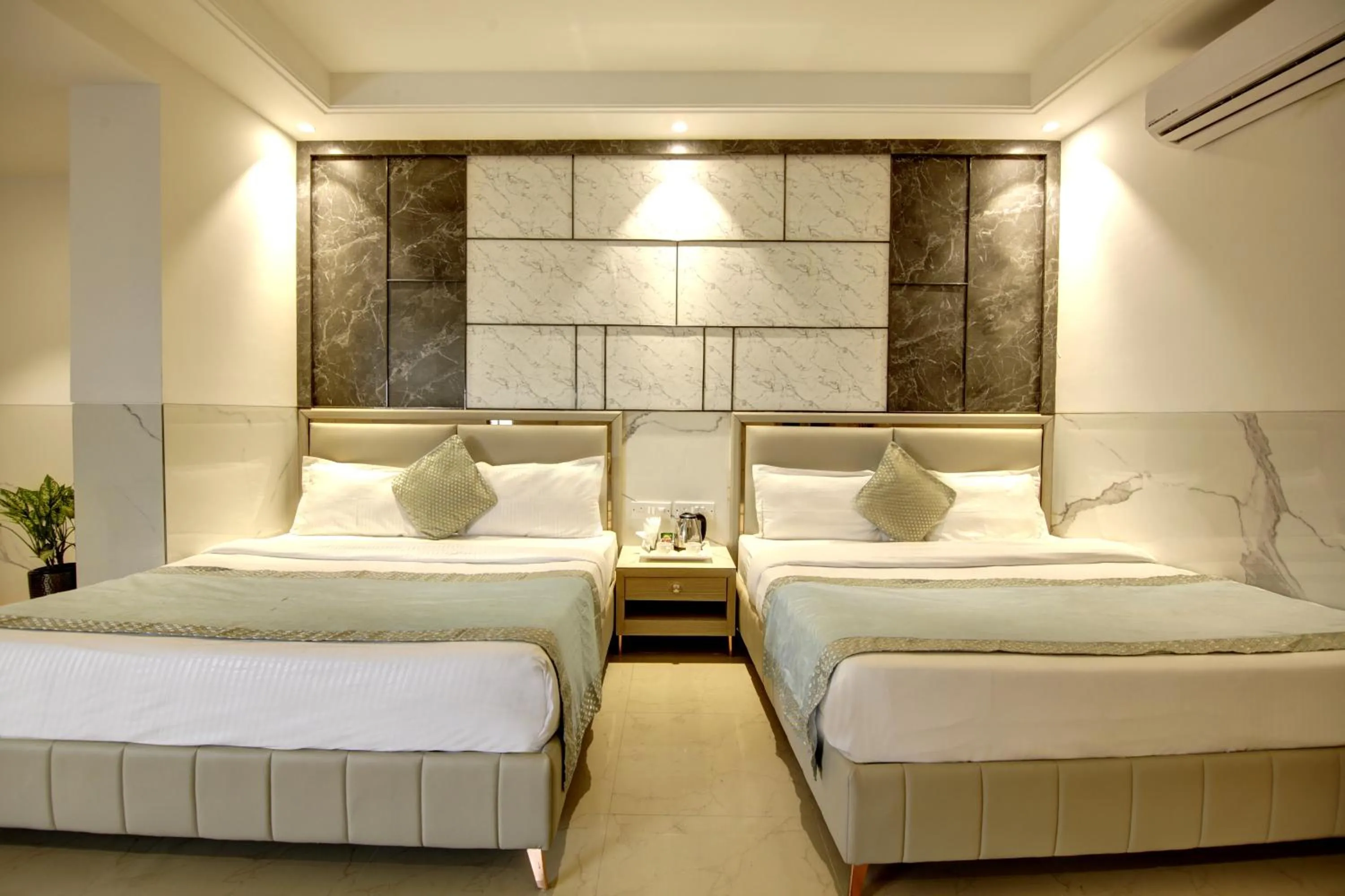 Bed in Hotel DELHI 37 by STAR GROUP