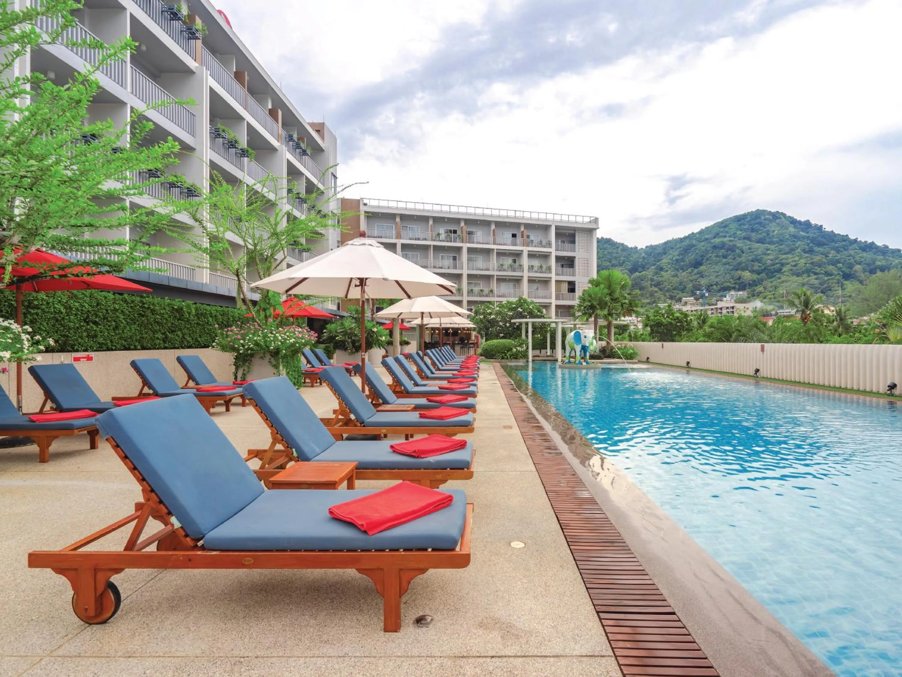 Swimming pool in Ramada by Wyndham Phuket Deevana