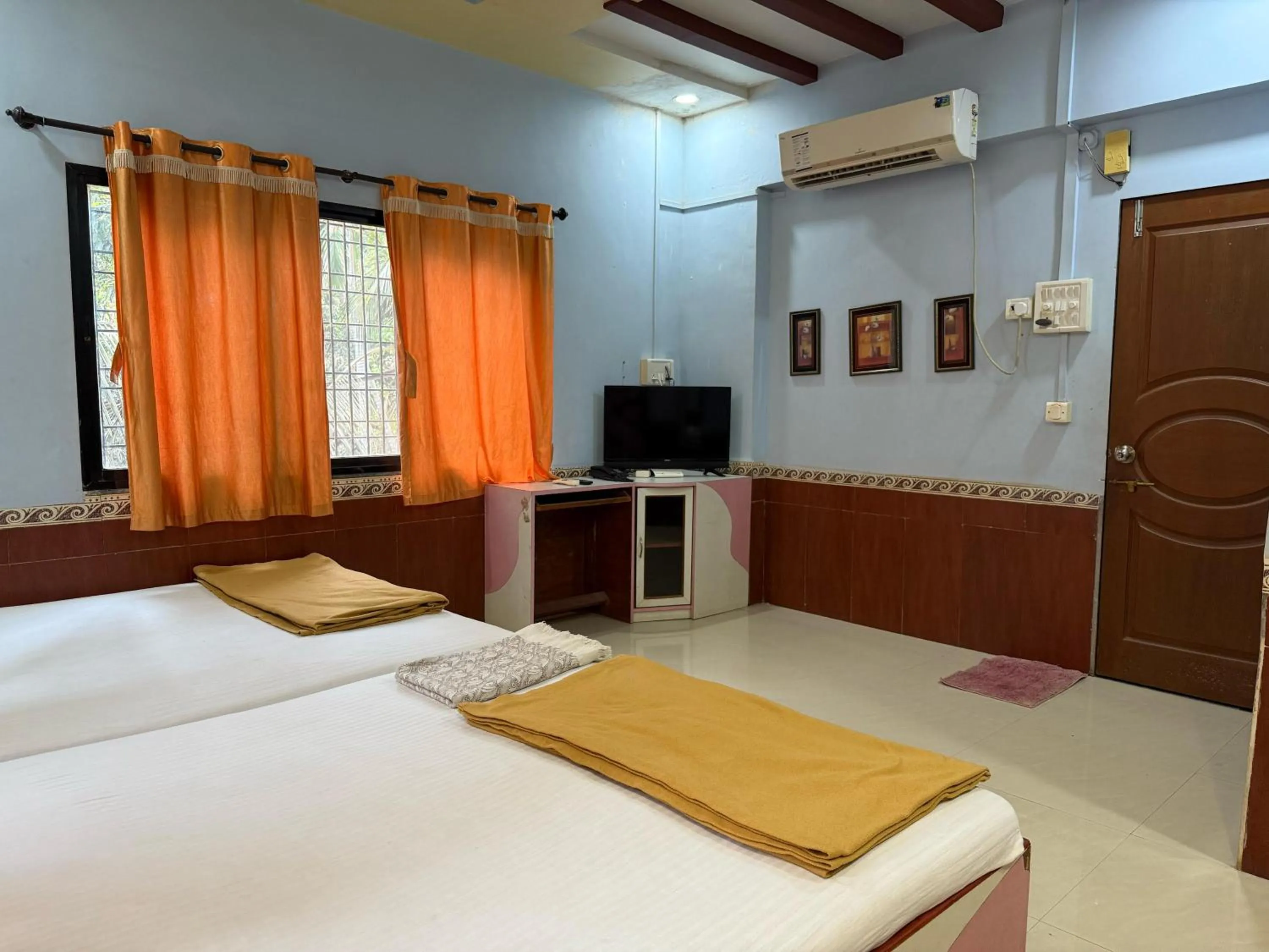 Bed in Jogalekar Cottage Alibaug