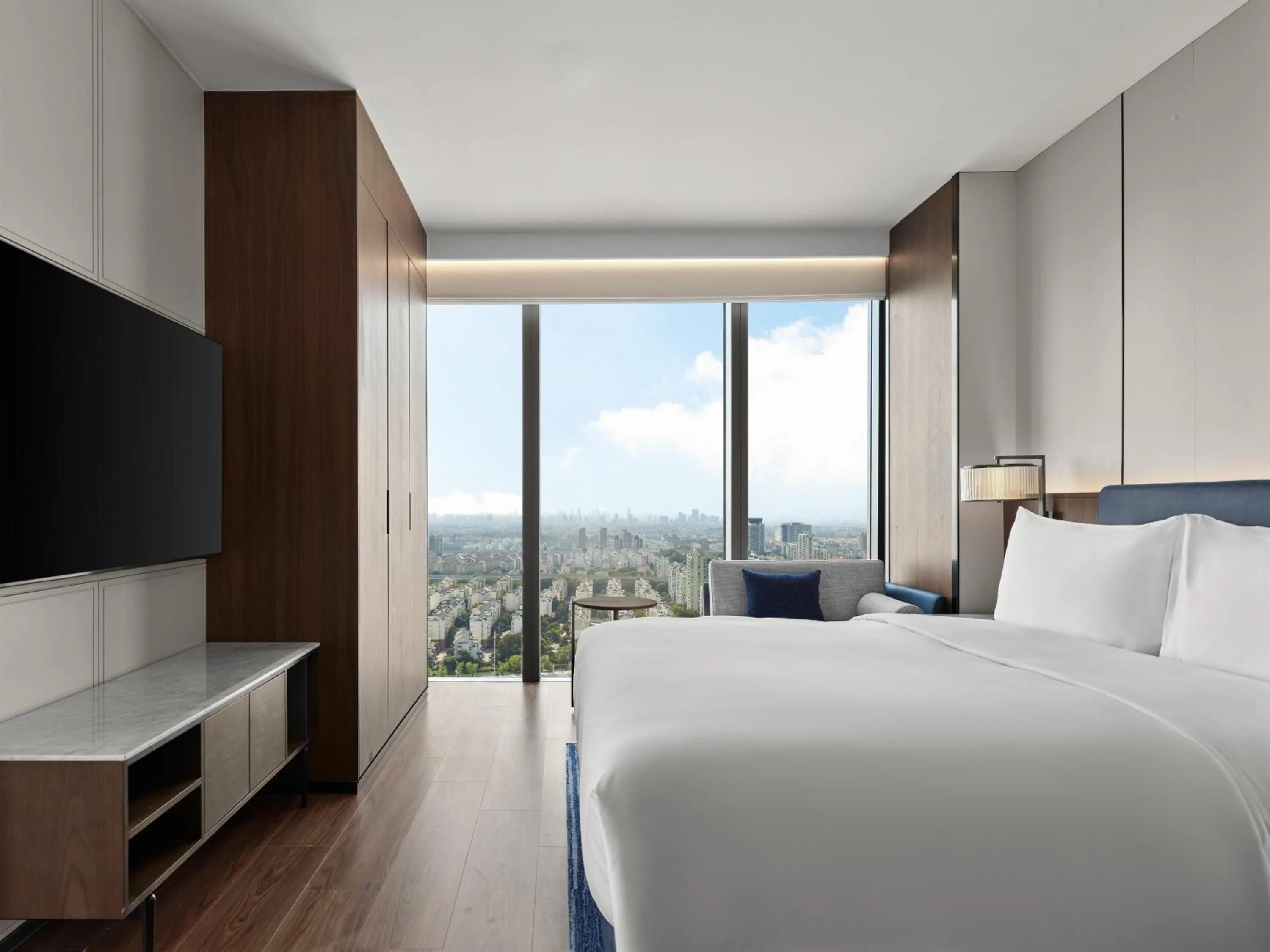 Photo of the whole room, Bed in Marriott Executive Apartments Suzhou Industrial Park