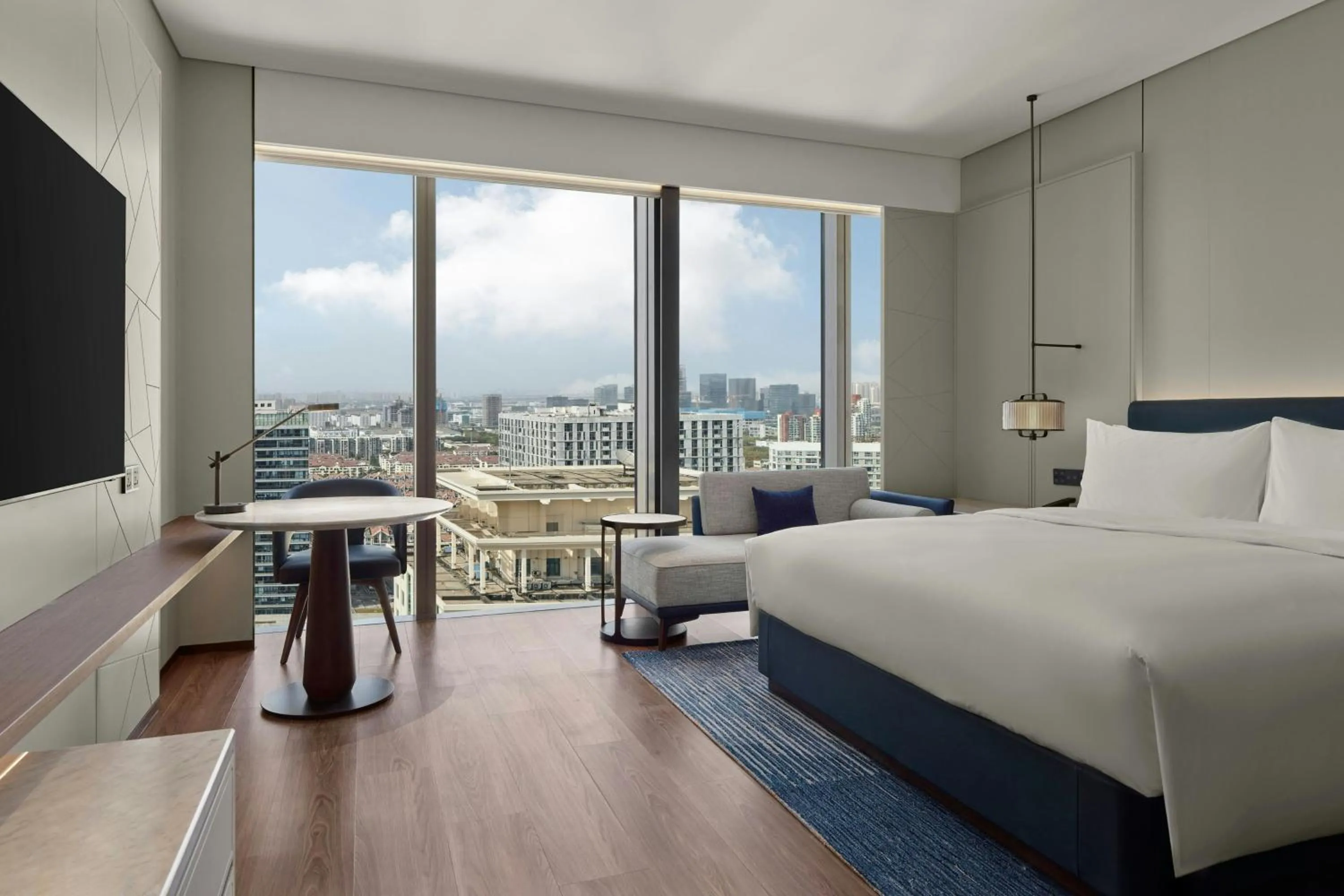 Photo of the whole room, Bed in Marriott Executive Apartments Suzhou Industrial Park