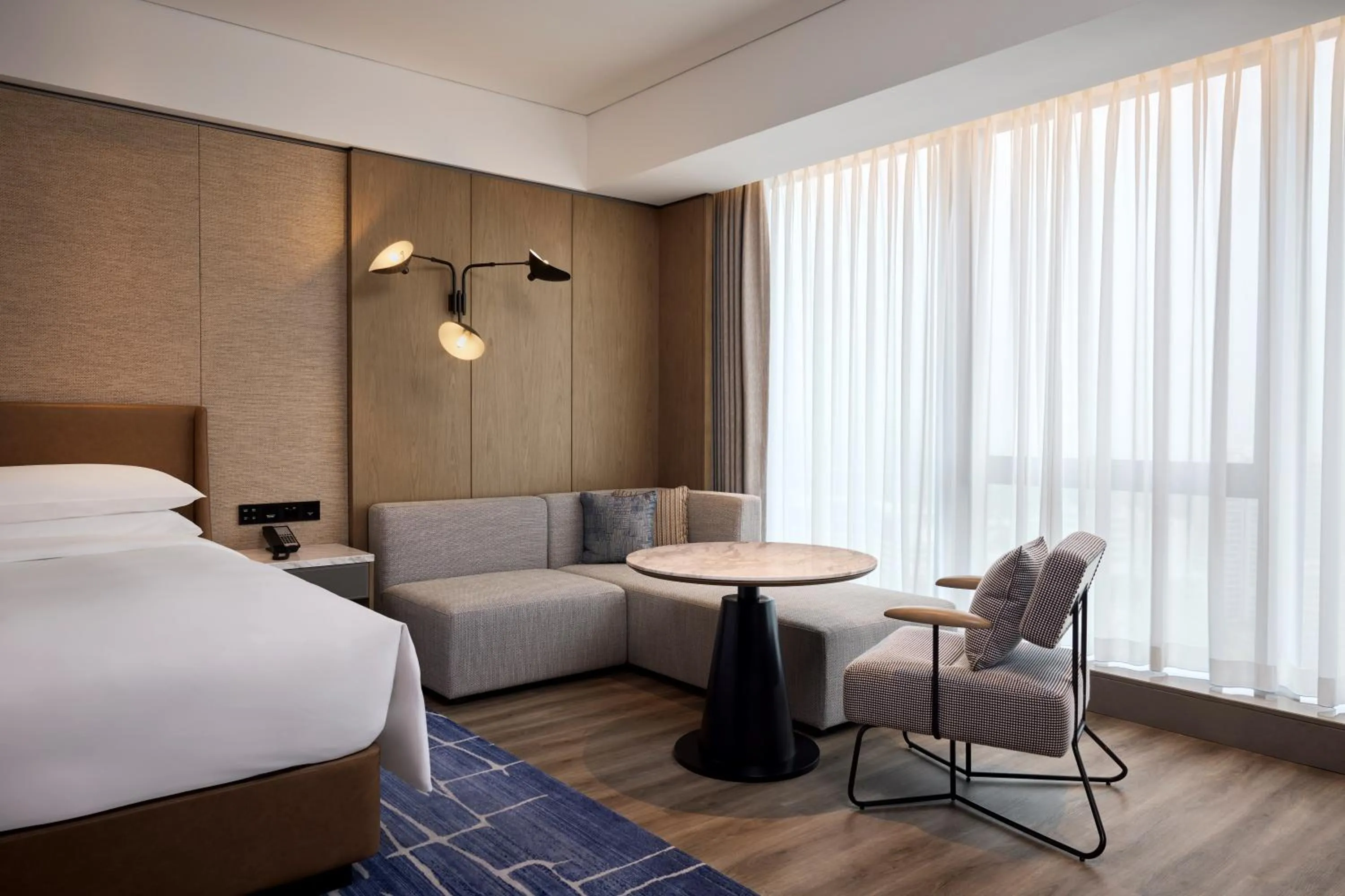 Seating area, Bed in Sheraton Grand Xiamen Jimei