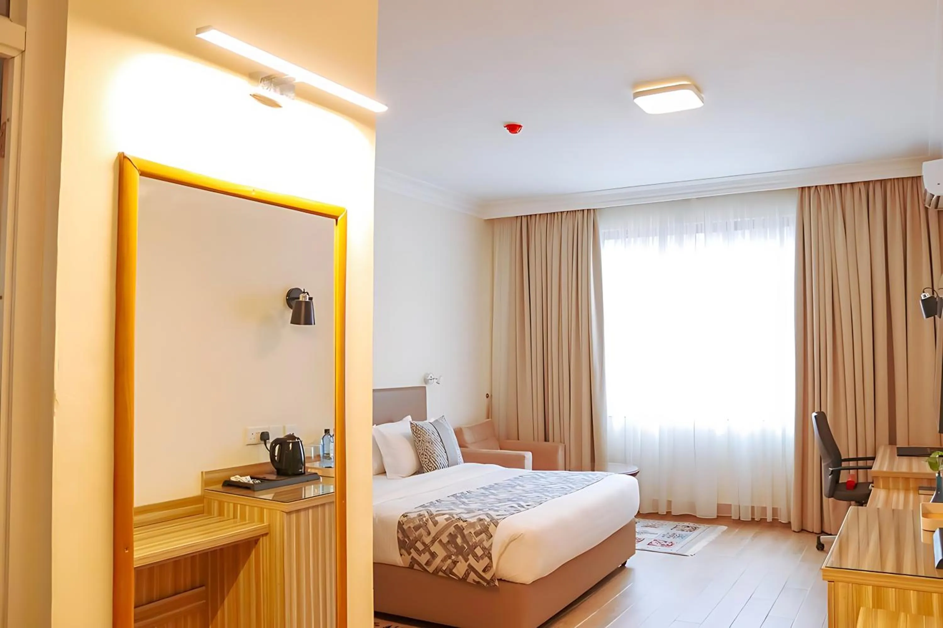 Photo of the whole room, Bed in Sportsview Hotel Kasarani