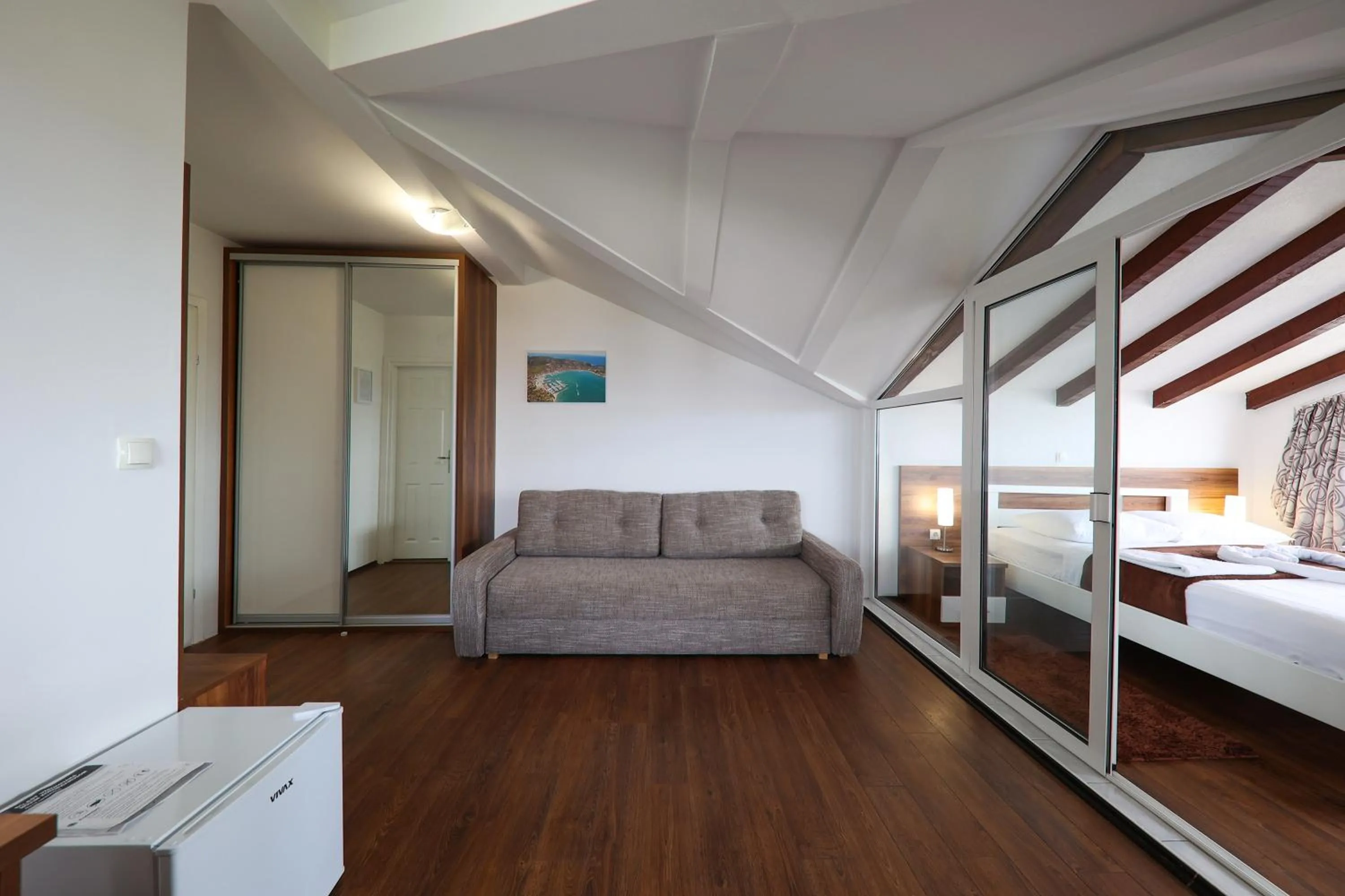 Living room, Bed in Hotel Murter