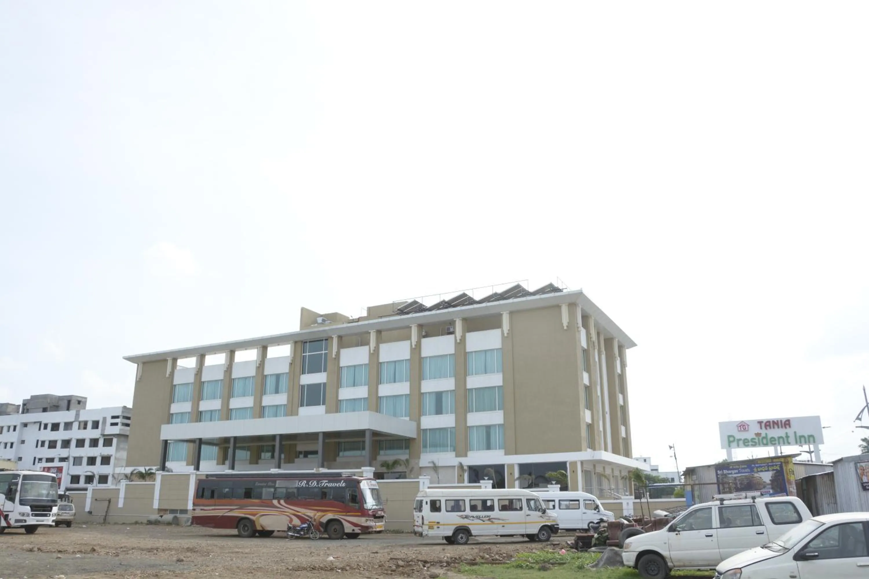 Property building in Tania President Inn