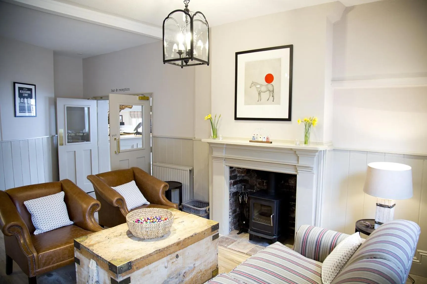 Communal lounge/ TV room in The White Horse Blakeney