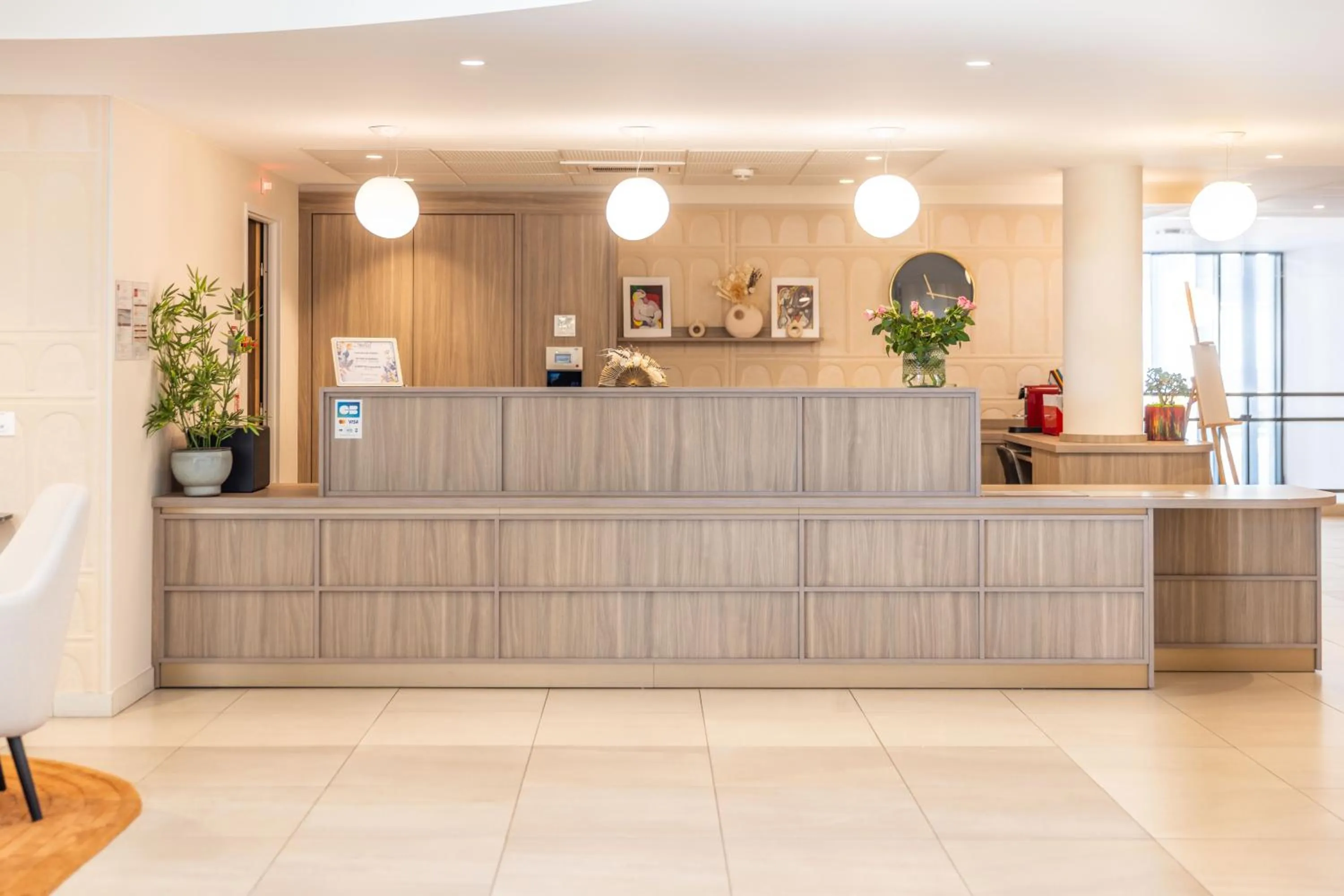 Lobby or reception in Zenao Appart'hôtels Villeneuve Loubet