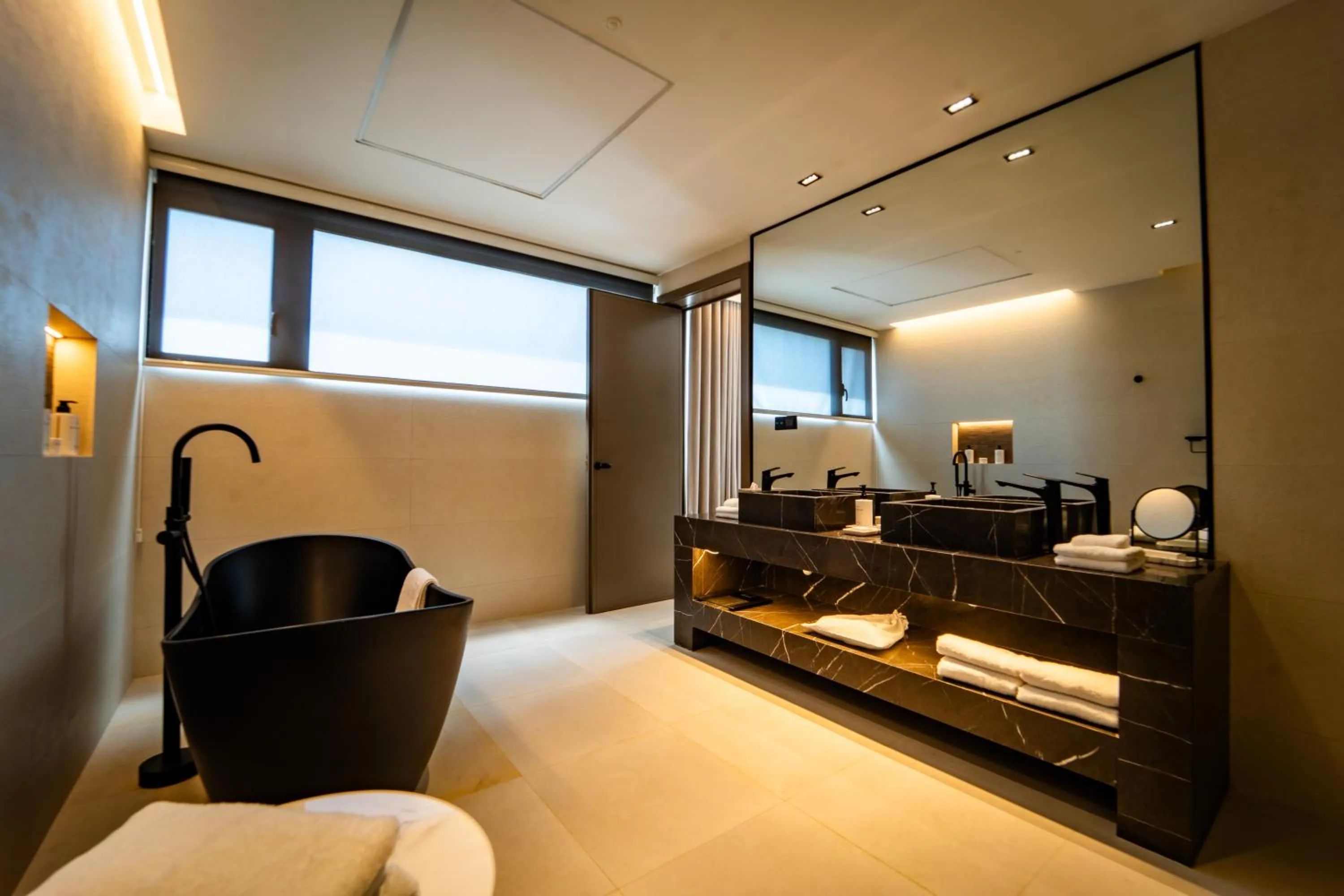 Bathroom, Bed in Nohian Collection Hotels