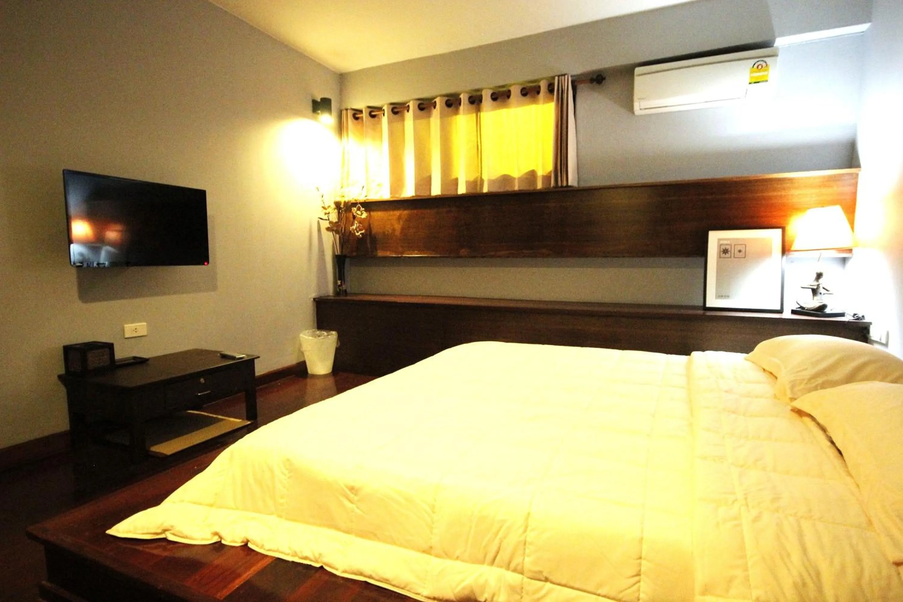 Bed in Baan Kieng Guest House Lampang