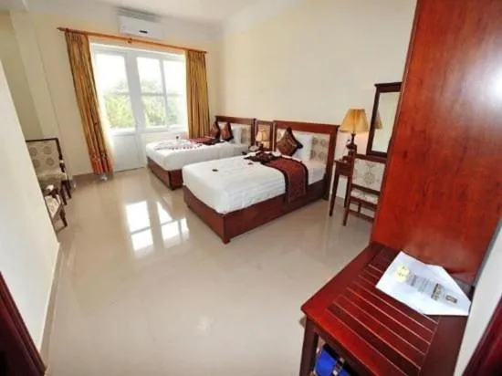 Bed in DUY TAN VINH Hotel