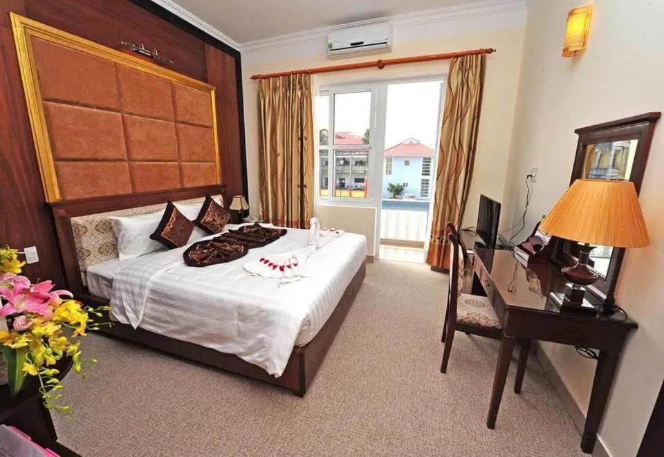 Bed in DUY TAN VINH Hotel