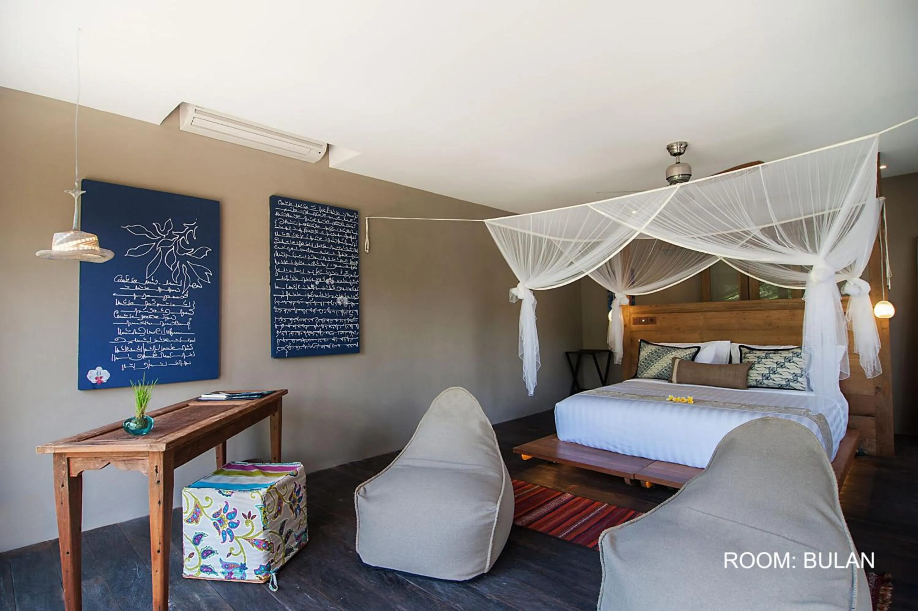 Bed in Blue Karma Dijiwa Ubud