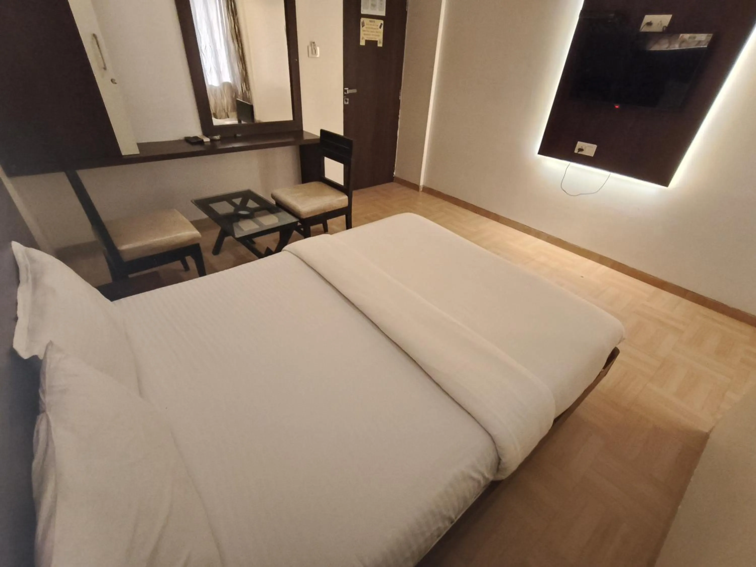 Bed in Hotel Vijay Sagar Dombivali