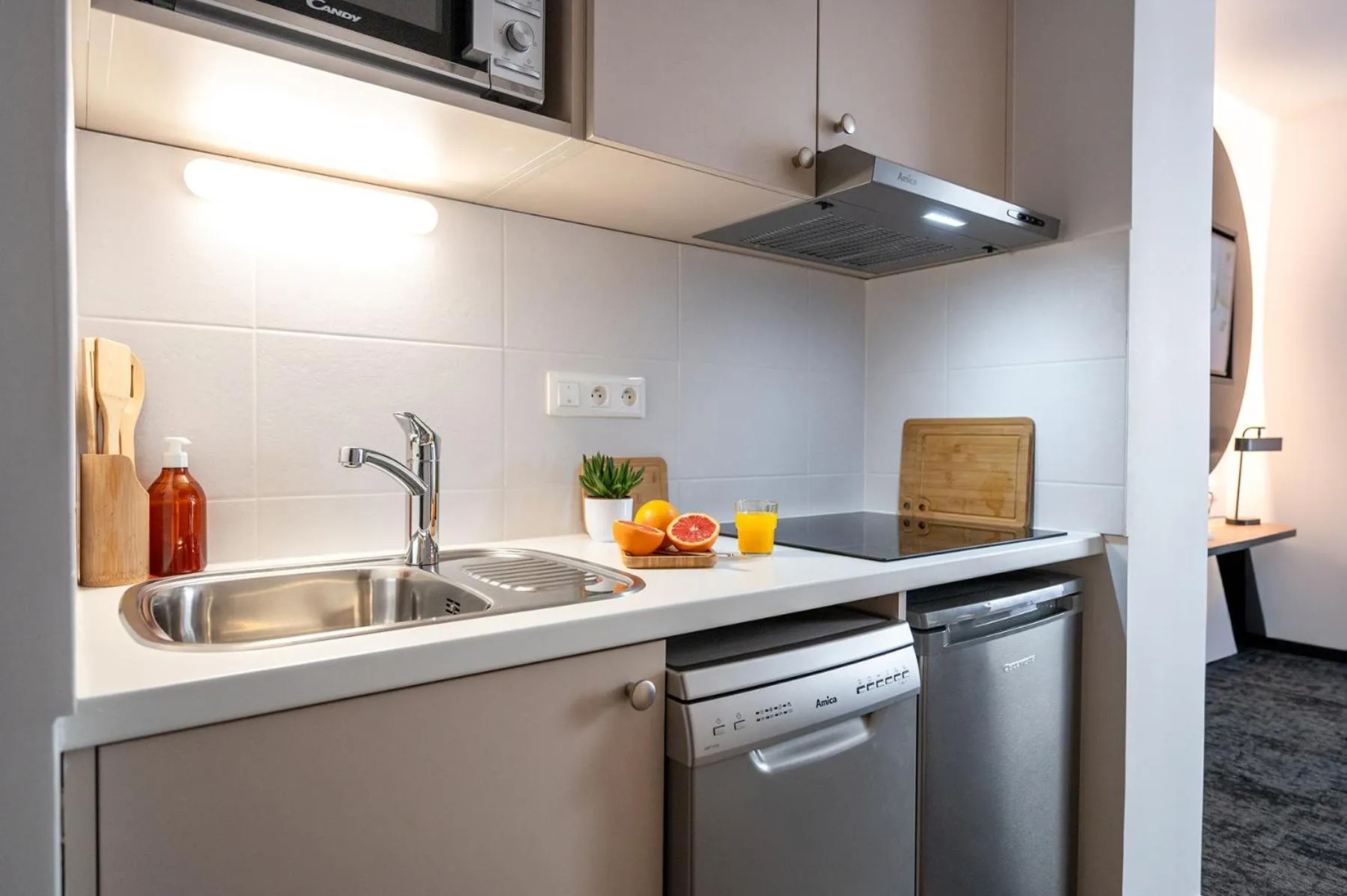 Kitchen or kitchenette in Nemea Appart Hotel La Boetie Bordeaux Pessac