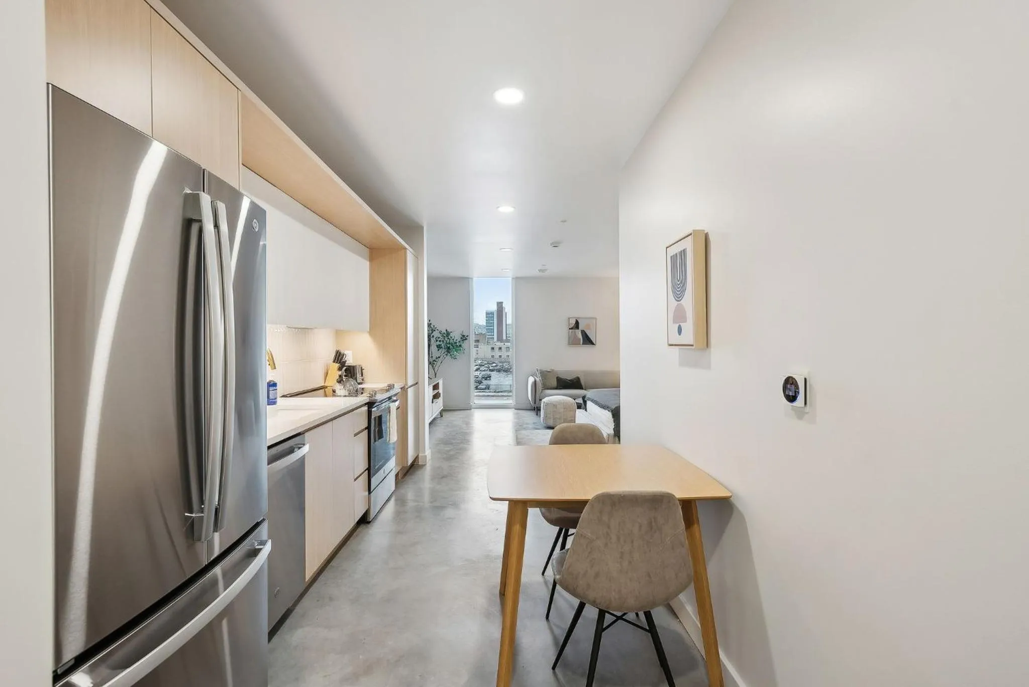 Kitchen or kitchenette in Placemakr Salt Lake City