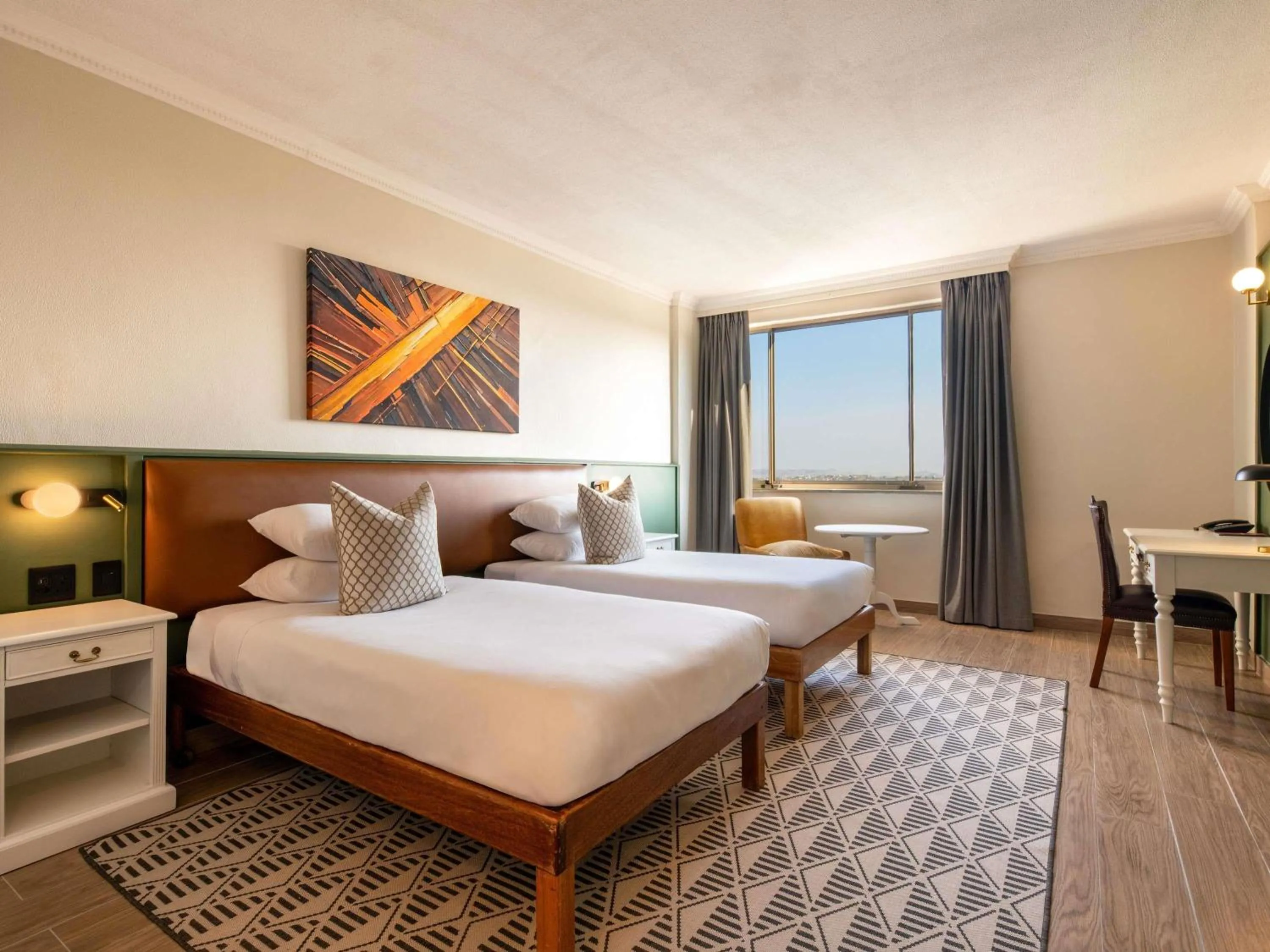 Bedroom, Bed in Mövenpick Hotel Windhoek