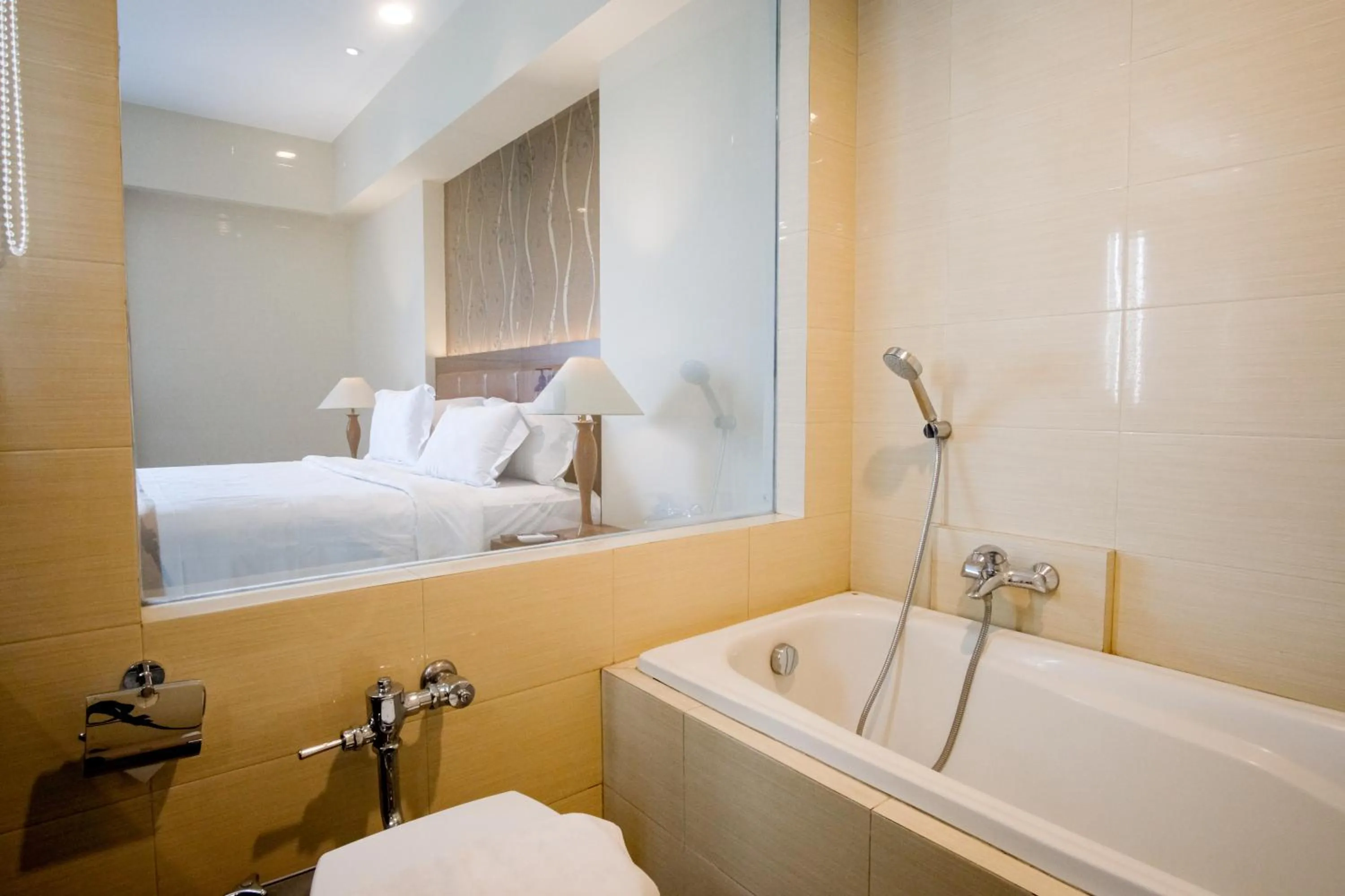 Bathroom, Bed in Istana Nelayan Hotel & Convention Powered by Archipelago