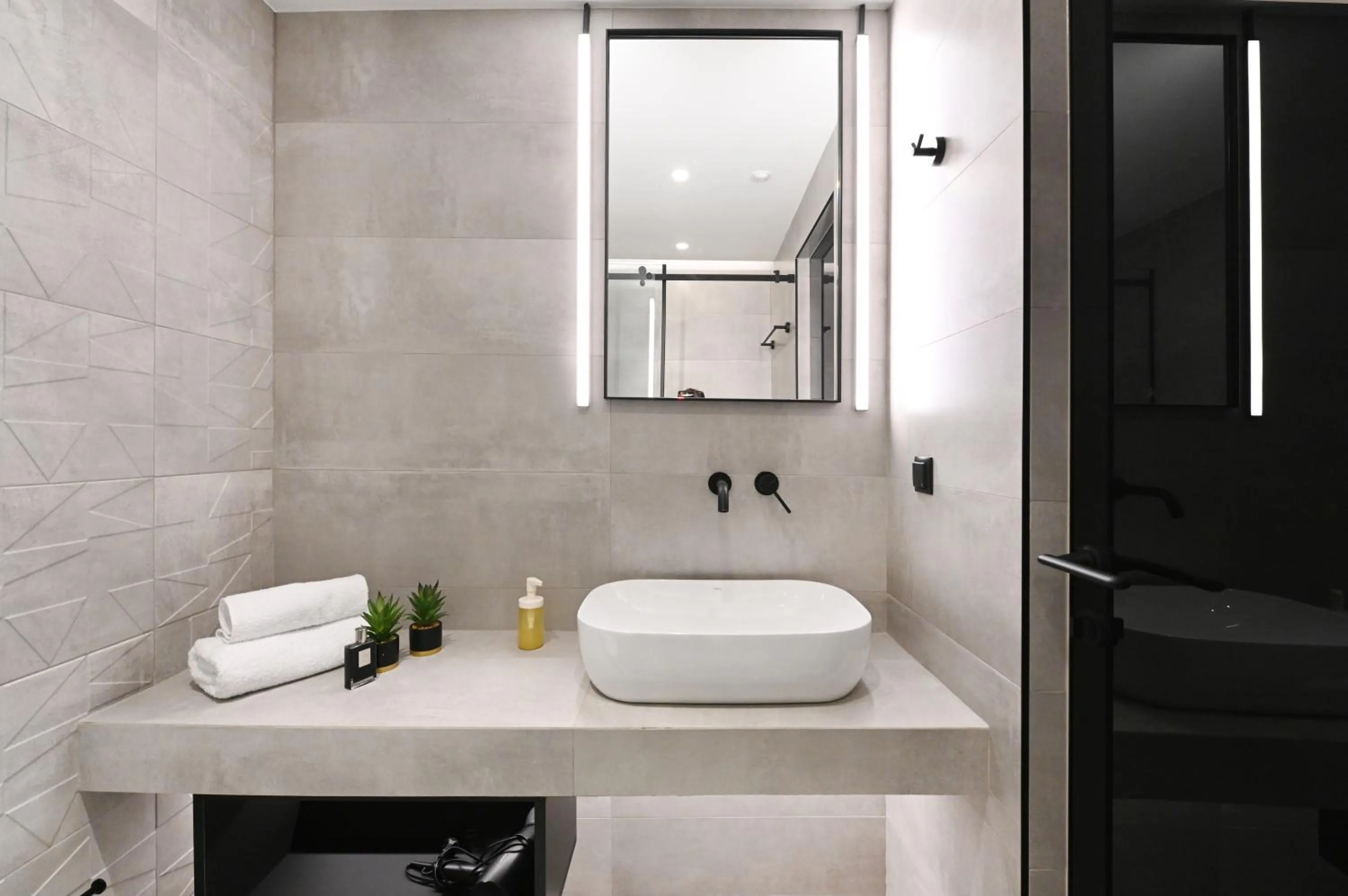 Bathroom in Icon Central SKG