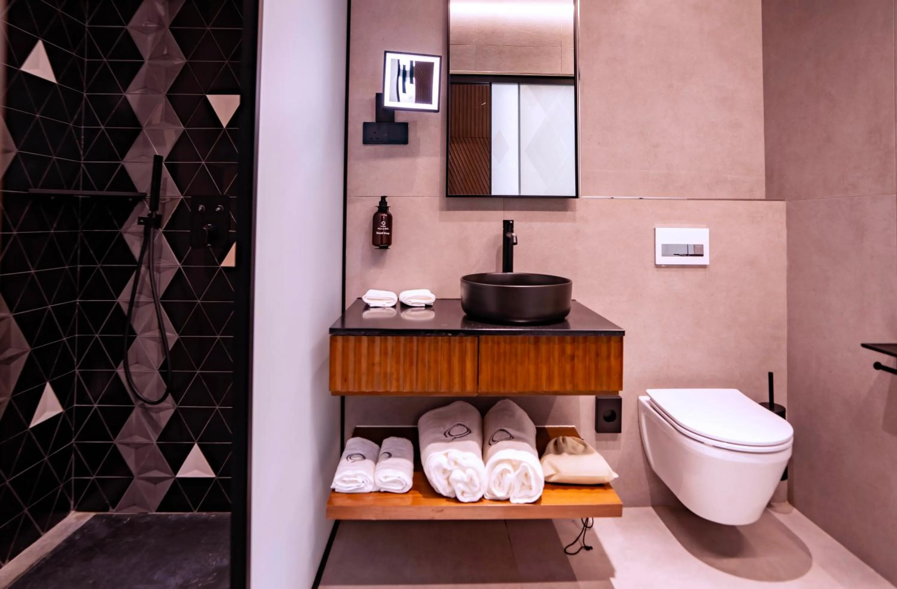 Shower in Onomo Allure Abuja AATC Hotel