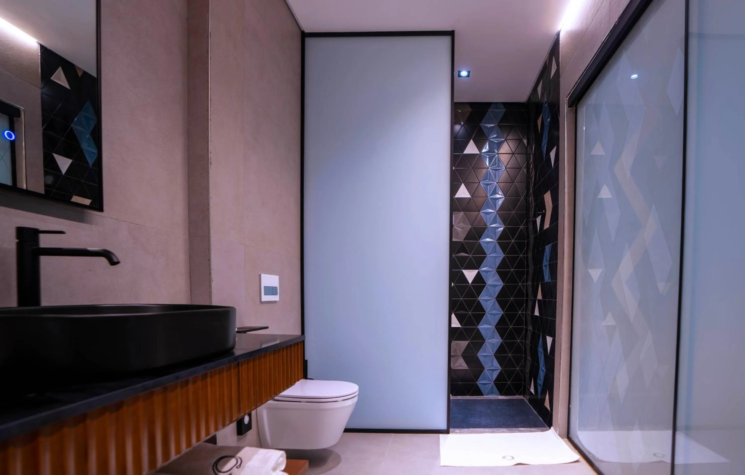 Shower in Onomo Allure Abuja AATC Hotel