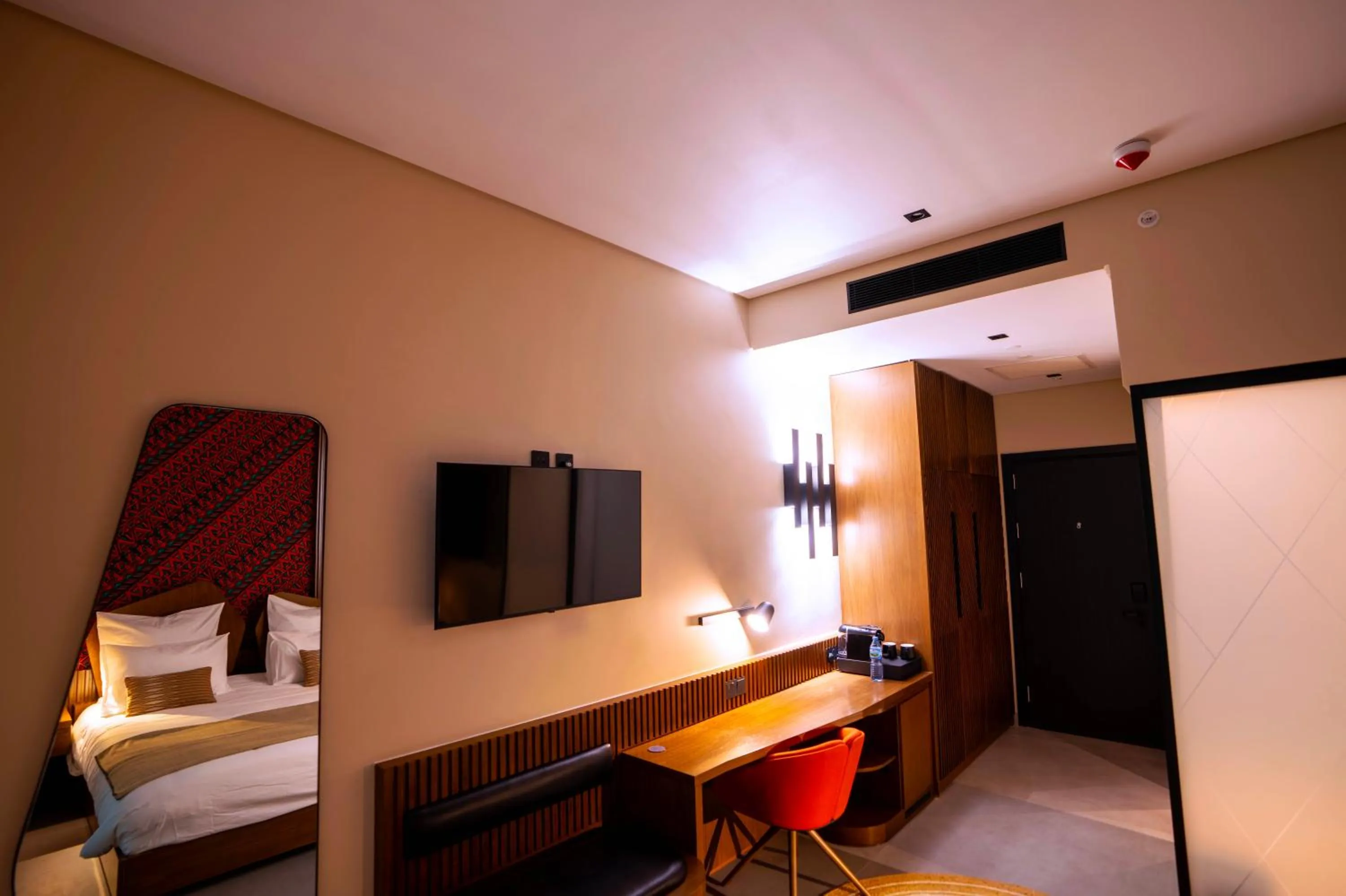 Bed in Onomo Allure Abuja AATC Hotel