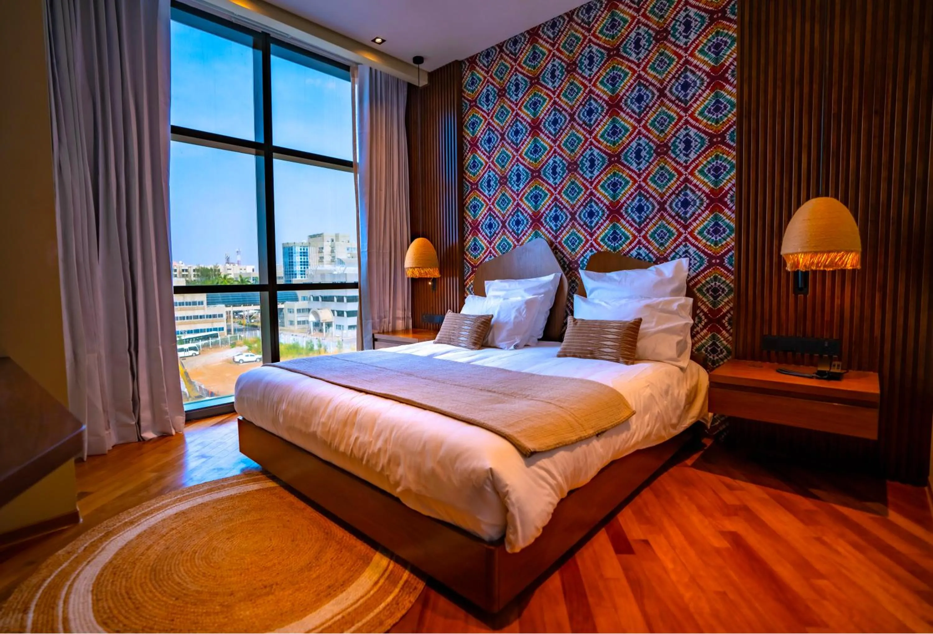 Bed in Onomo Allure Abuja AATC Hotel