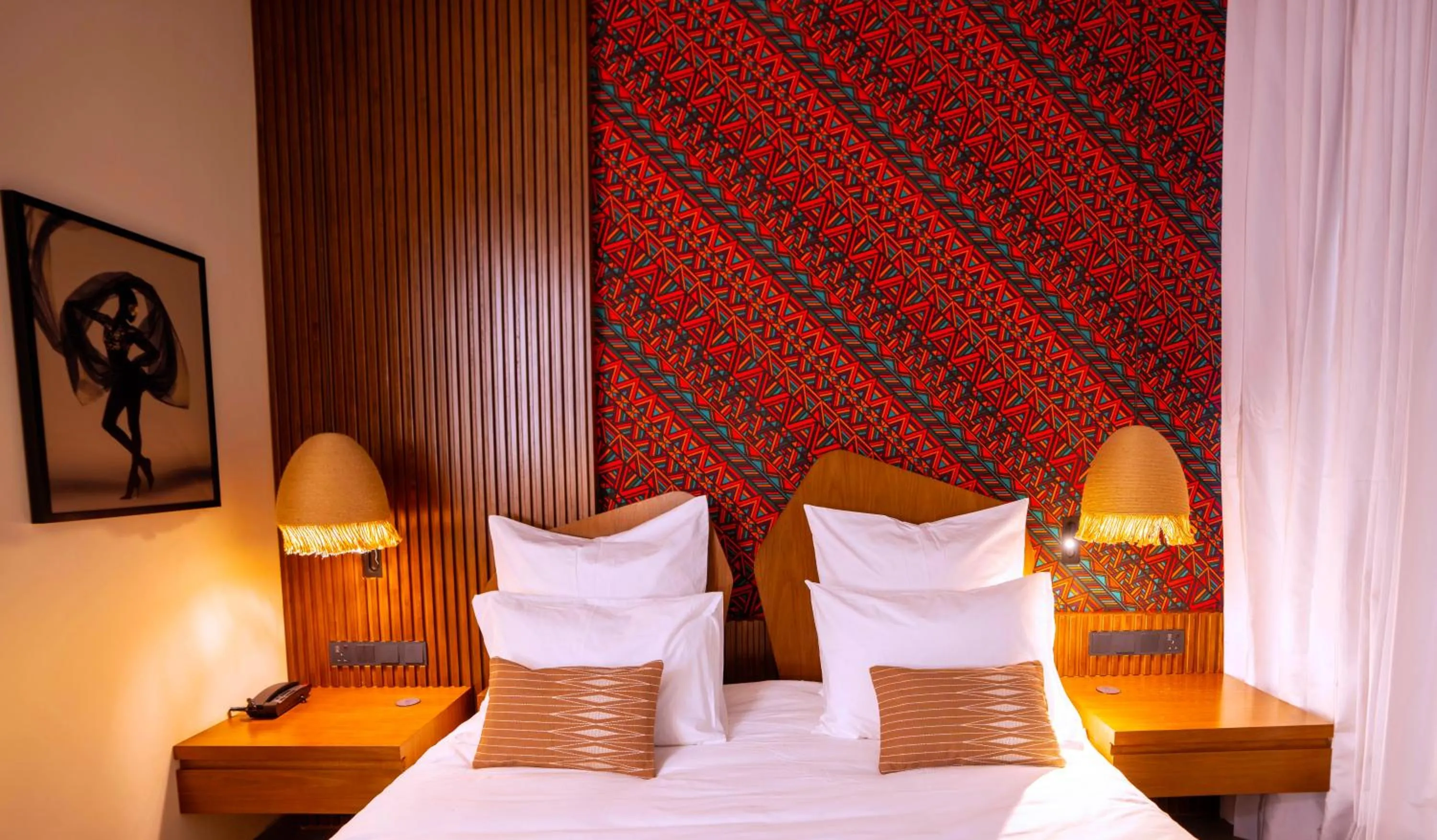 Bed in Onomo Allure Abuja AATC Hotel